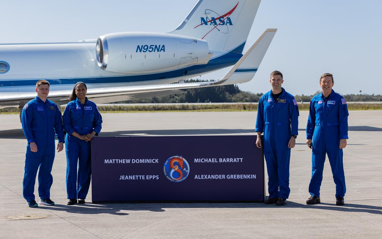 Crew members of NASA’s SpaceX Crew-8 mission to the International Space Station from right to left NASA astronauts Michael Barratt, Matthew Dominick, and Jeanette Epps, and Roscosmos cosmonaut Alexander Grebenkin, stand before members of the news media at the Launch and Landing Facility at Kennedy Space Center in Florida on Sunday, Feb. 25, 2024. The Crew-8 mission is slated to launch aboard SpaceX’s Dragon spacecraft, powered by the company’s Falcon 9 rocket from Launch Complex 39A no earlier than 12:04 a.m. EST on Friday, March 1, 2024.