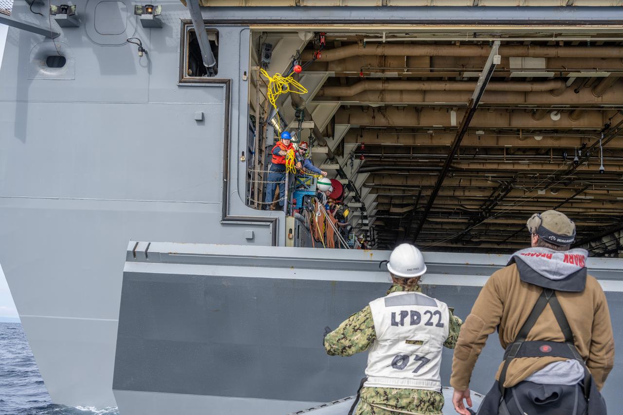 Members of NASA’s Exploration Ground System’s Landing and Recovery team and partners from the Department of Defense aboard the USS San Diego practice recovery procedures during Underway Recovery Test 11 (URT-11) off the coast of San Diego on Sunday, Feb. 25, 2024. URT-11 is the eleventh in a series of Artemis recovery tests, and the first time NASA and its partners put their Artemis II recovery procedures to the test with the astronauts.