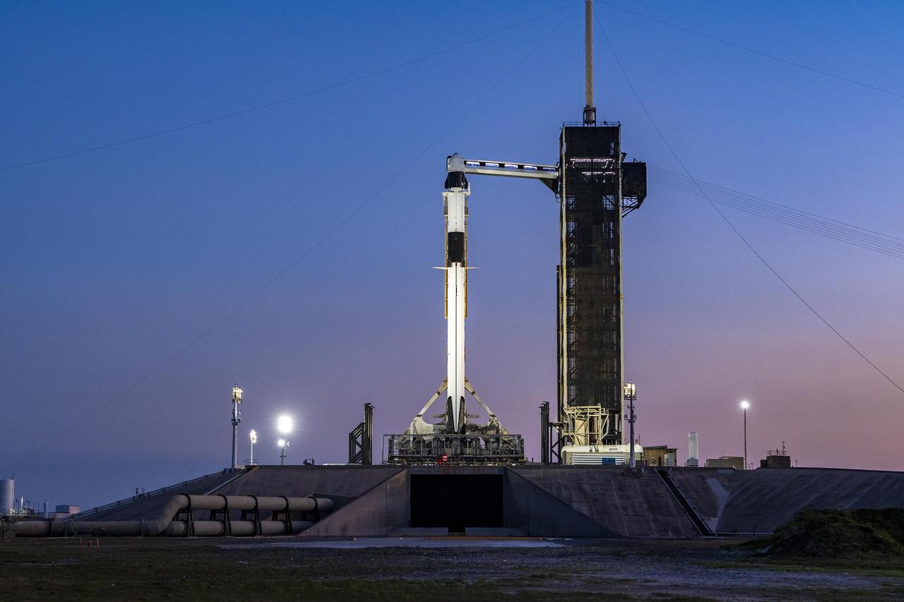 A SpaceX Falcon 9 rocket with the company's Dragon spacecraft on top is seen at sunset on the launch pad at Launch Complex 39A on Monday, Feb. 26, 2024, as preparations continue for NASA’s SpaceX Crew-8 mission at NASA’s Kennedy Space Center in Florida. The eighth crew rotation mission with SpaceX and the ninth flight of Dragon with people as part of the agency’s Commercial Crew Program is slated to carry NASA astronauts Matthew Dominick, Michael Barratt, and Jeanette Epps, and Roscosmos cosmonaut Alexander Grebenkin to the International Space Station from Launch Complex 39A no earlier than 12:04 a.m. EST on Friday, March 1.  