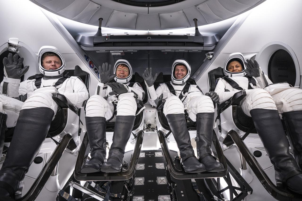 Members of NASA’s SpaceX Crew-8 from right to left, NASA astronauts Jeanette Epps, mission specialist; Matthew Dominick, commander; Michael Barratt, pilot; and Roscosmos cosmonaut Alexander Grebenkin, mission specialist, wave as they participate in a countdown dress rehearsal at the agency’s Kennedy Space Center in Florida on Monday, Feb. 26, 2024, to prepare for the upcoming Crew-8 launch to the International Space Station. Liftoff of the eighth crew rotation mission with SpaceX to the station and the ninth flight of Dragon with people as part of the agency’s Commercial Crew Program from Launch Complex 39A is targeted for 12:04 a.m. on Friday, March 1.