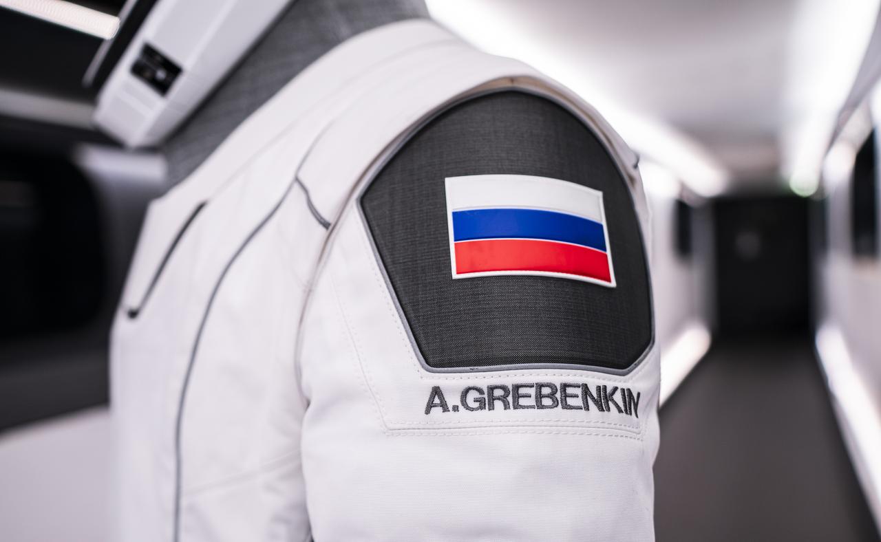 A SpaceX launch and entry suit bears a Russian flag and the name of Roscosmos cosmonaut Alexander Grebenkin, who will serve as one of two mission specialists for NASA's SpaceX Crew-8 mission to the International Space as part of the agency’s Commercial Crew Program. Liftoff from Launch Complex 39A at the agency’s Kennedy Space in Florida is scheduled for 12:04 a.m. EST on Friday, March 1, 2024. 