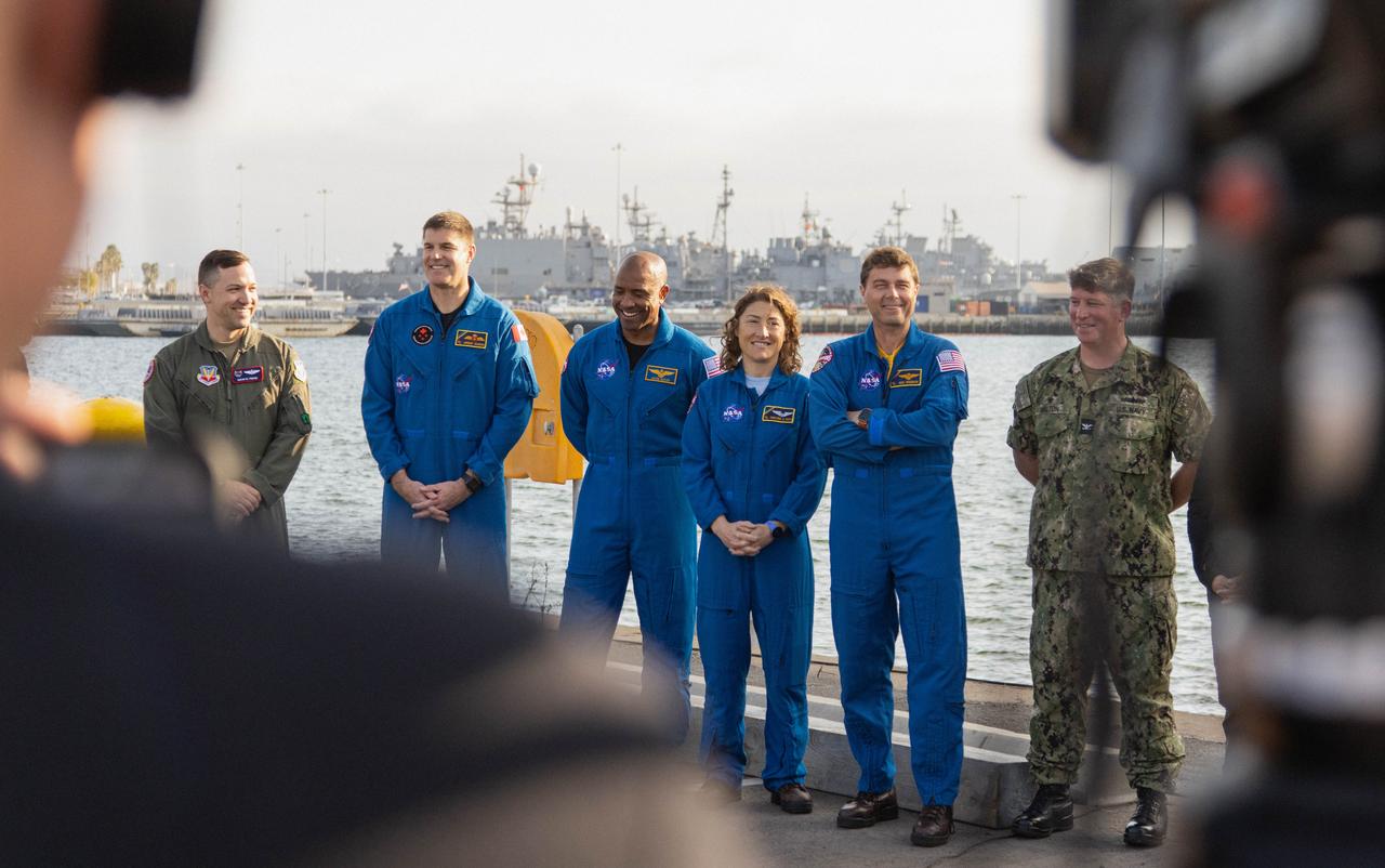 NASA’s Artemis II crew members, from left to right, CSA (Canadian Space Agency) astronaut Jeremy Hansen, NASA astronauts Victor Glover, Christina Koch, and Reid Wiseman smile during a news conference to discuss the practice recovery procedures following the Underway Recovery Test (URT-11) aboard the USS San Diego on Wednesday, Feb. 28, 2024. URT-11 performed by NASA’s Exploration Ground System’s Landing and Recovery team, partners from the Department of Defense, and U.S. Navy personnel aboard the USS San Diego is the eleventh in a series of Artemis recovery tests, and the first the Artemis II recovery procedures involved the astronauts.