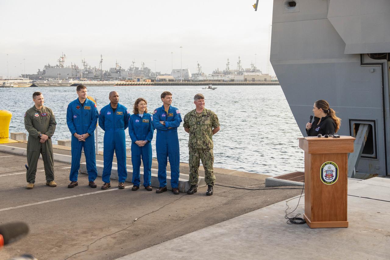 NASA’s Artemis II crew members, from left to right, CSA (Canadian Space Agency) astronaut Jeremy Hansen, NASA astronauts Victor Glover, Christina Koch, and Reid Wiseman, along with partners from the Department of Defense, and U.S. Navy personnel smile during a news conference held in San Diego, California on Wednesday, Feb. 28, 2024, to discuss the Underway Recovery Test (URT-11) aboard the USS San Diego. URT-11 is the eleventh in a series of Artemis recovery tests, and the first time NASA and its partners put their Artemis II recovery procedures in place with the astronauts.