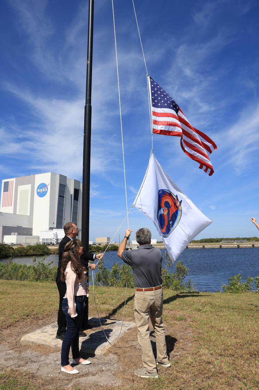 NASA’s SpaceX Crew-8 flag is raised, Wednesday, Feb. 28, 2024, near the countdown clock at the NASA News Center at the agency’s Kennedy Space Center in Florida. The Crew-8 mission will send NASA astronauts Matthew Dominick, Michael Barratt, and Jeanette Epps, and Roscosmos cosmonaut Alexander Grebenkin, to the International Space Station aboard SpaceX’s Dragon spacecraft on the company’s Falcon 9 rocket from Kennedy’s Launch Complex 39A no earlier than 11:16 p.m. EDT Saturday, March 2.