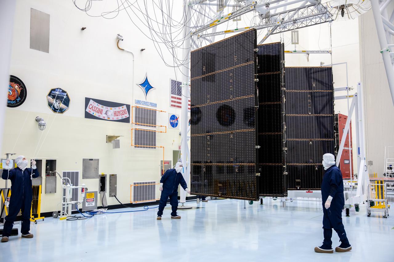 Technicians working inside the Payload Hazardous Servicing Facility at the agency’s Kennedy Space Center in Florida unfolded and fully extended the first of two five-panel solar arrays built for NASA’s Europa Clipper in preparation for inspection and cleaning as part of assembly, test, and launch operations on Wednesday, March 6, 2024. When both solar arrays are installed and deployed on Europa Clipper – the agency’s largest spacecraft ever developed for a planetary mission – the spacecraft will span a total length of more than 100 feet and weigh 7,145 pounds without the inclusion of propellants. 
