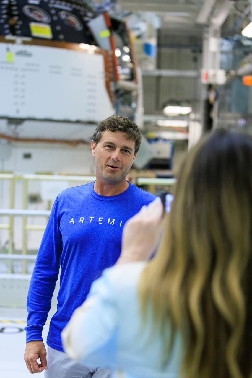 NASA’s Artemis II mission Commander Reid Wiseman films his weekly Artemis Update for his social media platforms in front of the Orion spacecraft for Artemis II inside the Neil A. Armstrong Operations and Checkout Building at the agency’s Kennedy Space Center in Florida, on Friday, March 15, 2024.