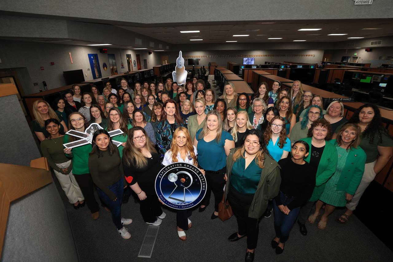 The women who comprise the Artemis launch team are photographed inside Firing Room 1 of the Launch Control Center at NASA’s Kennedy Space Center in Florida on Friday, March 15, 2024. In the second row center behind the Exploration Ground Systems sign is NASA’s first female Launch Director Charlie Blackwell-Thompson. The team, which is about 30% women, will launch the agency’s Artemis II mission from Kennedy’s Launch Pad 39B, the first crewed mission on NASA's path to establishing a long-term presence at the Moon for science and exploration through Artemis.