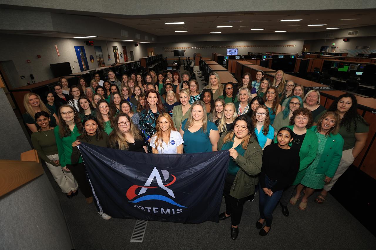 The women who comprise the Artemis launch team are photographed inside Firing Room 1 of the Launch Control Center at NASA’s Kennedy Space Center in Florida on Friday, March 15, 2024. In the second row center behind the Artemis banner is NASA’s first female Launch Director Charlie Blackwell-Thompson. The team, which is about 30% women, will launch the agency’s Artemis II mission from Kennedy’s Launch Pad 39B, the first crewed mission on NASA's path to establishing a long-term presence at the Moon for science and exploration through Artemis.