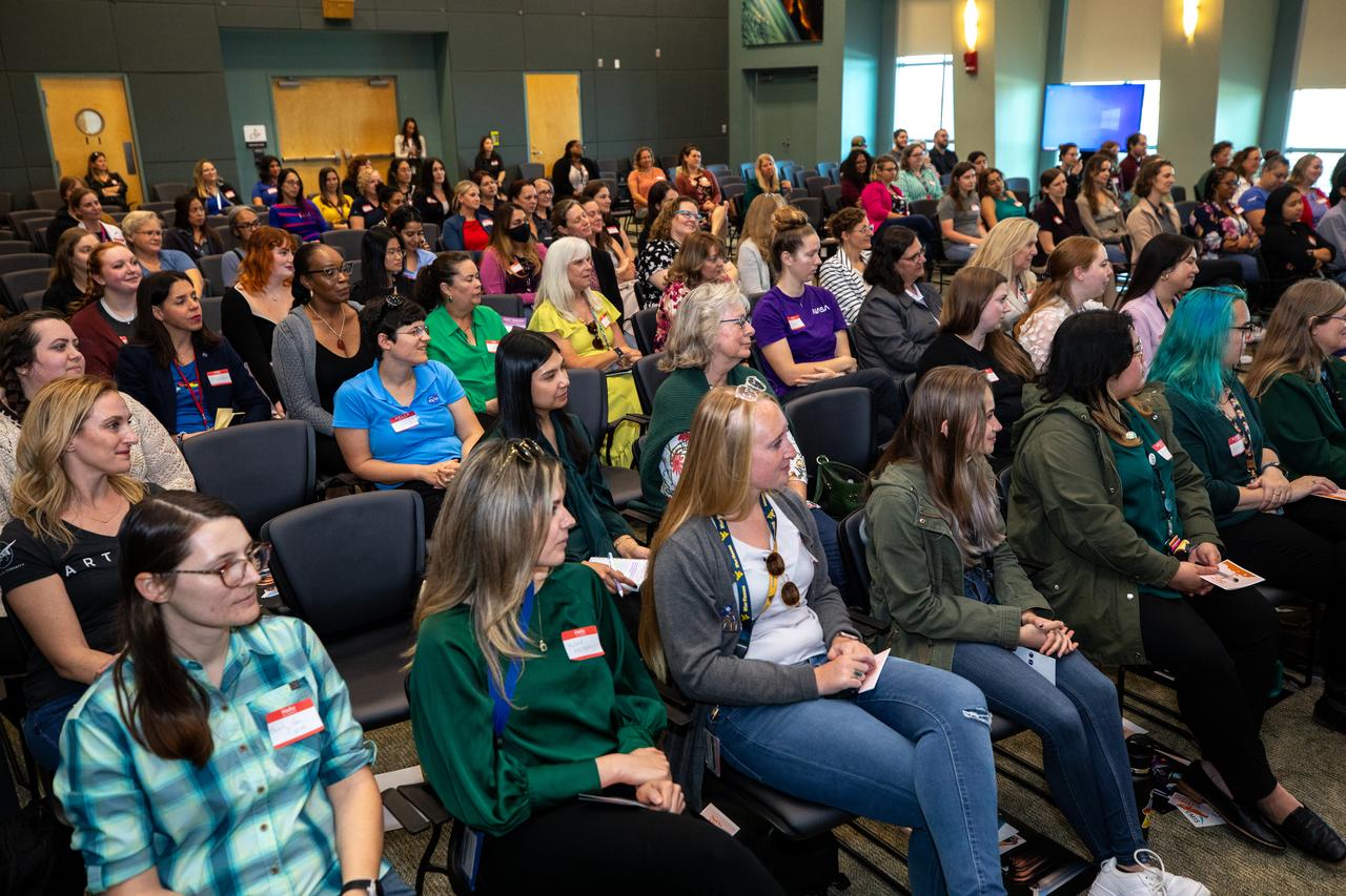 Employees from NASA’s Kennedy Space Center in Florida attend a panel discussion featuring women in leadership roles across NASA in honor of Women's History Month inside the Operations Support Building II at the agency’s Kennedy Space Center in Florida held on Friday, March 15, 2024. Participants in the Women Launching Women panel commemorate inspirational women and men who have lifted and helped others excel in their careers across the agency and offer words of advice for the current workforce include JoAnn Morgan, former associate director of Kennedy Space Center; Janet Petro, Kennedy Space Center director; Charlie Blackwell Thompson, NASA Artemis launch director; Lorna Kenna, vice president and program manager of Jacobs Space Operations Group; Kim Carter, Kennedy Space Center Office of Center Engagement and Business Integration Services director; and Casey Swails, NASA deputy associate administrator.
