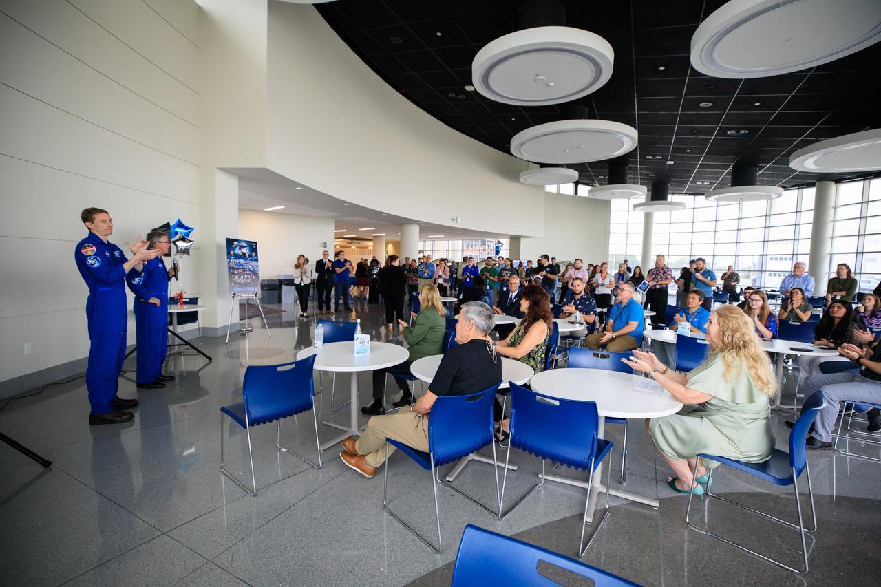 NASA’s SpaceX Crew-6 astronauts Warren “Woody” Hoburg and Stephen Bowen speak to NASA employees and other personnel on Wednesday, March 27, 2024, at the agency’s Central Campus Headquarters cafeteria at Kennedy Space Center in Florida. Not only could employees meet Crew-6 astronauts, but it was also an opportunity celebrate the recent retirement of previous center director Bob Cabana who held the position for 13 years.