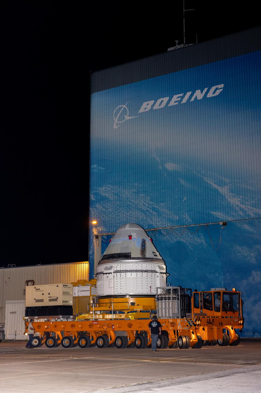 Boeing’s Starliner spacecraft, set to carry NASA astronauts Butch Wilmore and Suni Williams on the agency’s Boeing Crew Flight Test to the International Space Station, rolls out of the company’s Commercial Crew and Cargo Processing Facility at NASA’s Kennedy Space Center in Florida on Tuesday, April 16, 2024. The spacecraft will be transported to ULA’s (United Launch Alliance) Vertical Integration Facility at Space Launch Complex-41 at Cape Canaveral Space Force Station to be lifted and connected to the Atlas V rocket for launch no earlier than Monday, May 6, 2024.
