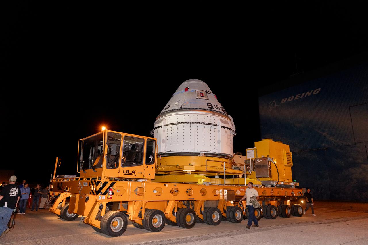 Boeing’s Starliner spacecraft, set to carry NASA astronauts Butch Wilmore and Suni Williams on the agency’s Boeing Crew Flight Test to the International Space Station, rolls out of the company’s Commercial Crew and Cargo Processing Facility at NASA’s Kennedy Space Center in Florida on Tuesday, April 16, 2024. The spacecraft will be transported to ULA’s (United Launch Alliance) Vertical Integration Facility at Space Launch Complex-41 at Cape Canaveral Space Force Station to be lifted and connected to the Atlas V rocket for launch no earlier than Monday, May 6, 2024.