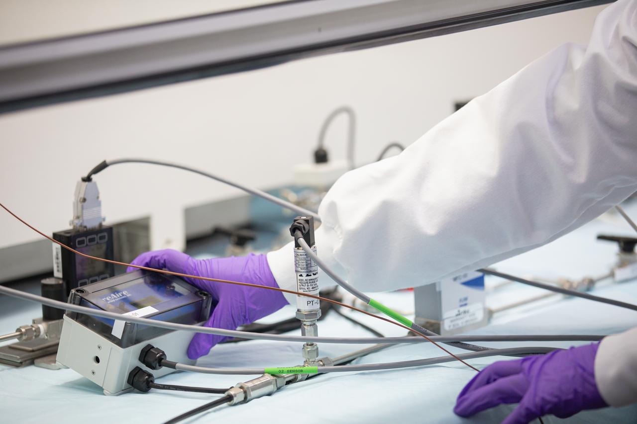 Inside a laboratory in the Neil A. Armstrong Operations and Checking Building at NASA’s Kennedy Space Center in Florida, testing is underway with the Volatile Monitoring Oxygen Measurement Subsystem (VMOMS) for Molten Regolith Electrolysis (MRE) on April 19, 2024. The high-temperature electrolytic process aims to extract oxygen from simulated lunar regolith, which will be critical to the agency’s Artemis campaign.  Oxygen extracted from the Moon can be utilized for propellent to NASA’s lunar landers, breathable oxygen for astronauts, and a variety of other industrial and scientific applications for NASA’s future missions to the Moon.   