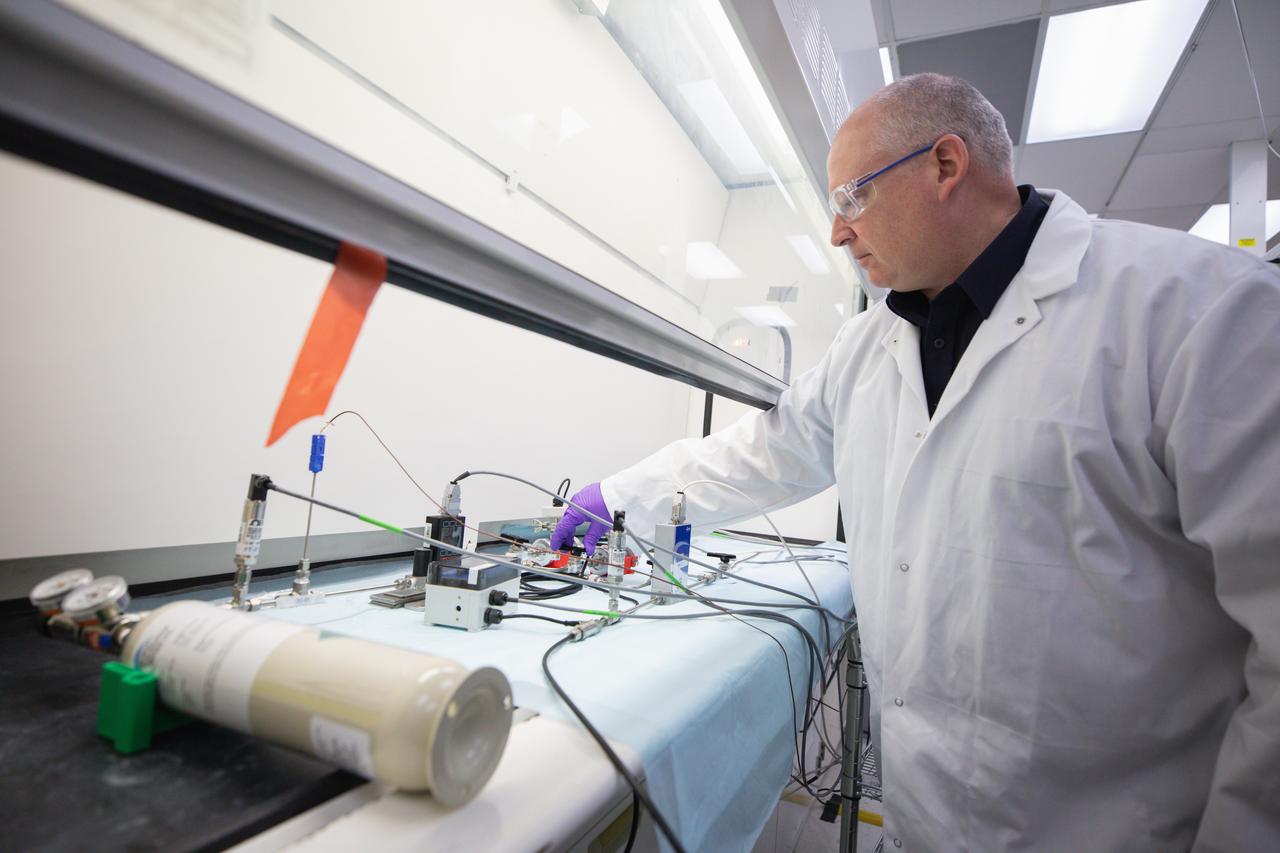 Dr. Joel Olson, subject matter expert, conducts testing of the Volatile Monitoring Volatile Monitoring Oxygen Measurement Subsystem (VMOMS) for Molten Regolith Electrolysis (MRE) inside a laboratory in the Neil A. Armstrong Operations and Checkout Building at NASA’s Kennedy Space Center in Florida on April 19, 2024. The high-temperature electrolytic process aims to extract oxygen from simulated lunar regolith which will be critical to the agency’s Artemis campaign. Oxygen extracted from the Moon can be utilized for propellent to NASA’s lunar landers, breathable oxygen for astronauts, and a variety of other industrial and scientific applications for NASA’s future missions to the Moon.