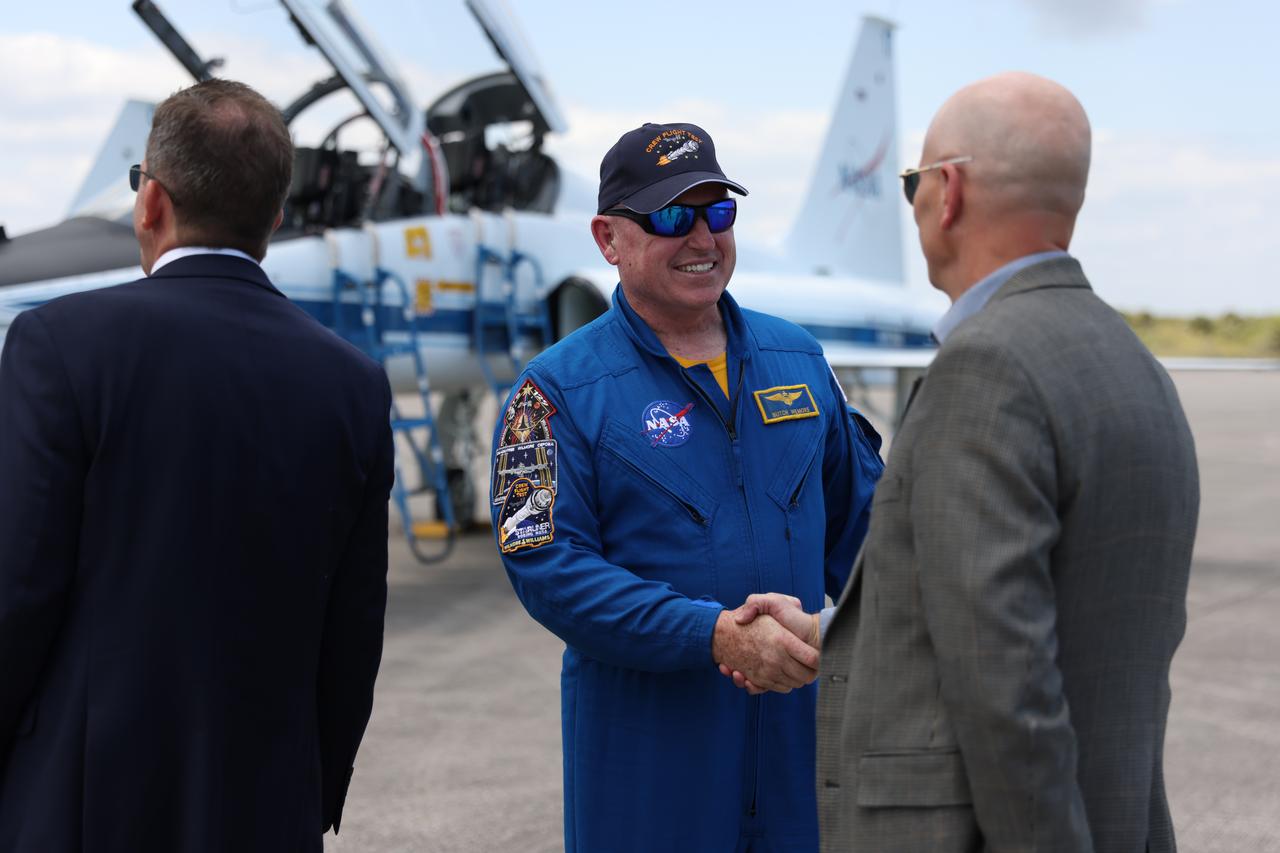 NASA astronauts Butch Wilmore greets NASA officials at the Launch and Landing Facility at NASA’s Kennedy Space Center in Florida following his arrival for the agency’s Boeing Crew Flight Test. As part of the agency’s Commercial Crew Program, Wilmore is joind by NASA astronaut Suni Williams as the first crew to launch aboard Boeing’s Starliner spacecraft atop a United Launch Alliance Atlas V rocket from Space Launch Complex-41 at Cape Canaveral Space Force Station in Florida. Liftoff is scheduled for 10:34 p.m. ET on Monday, May 6.