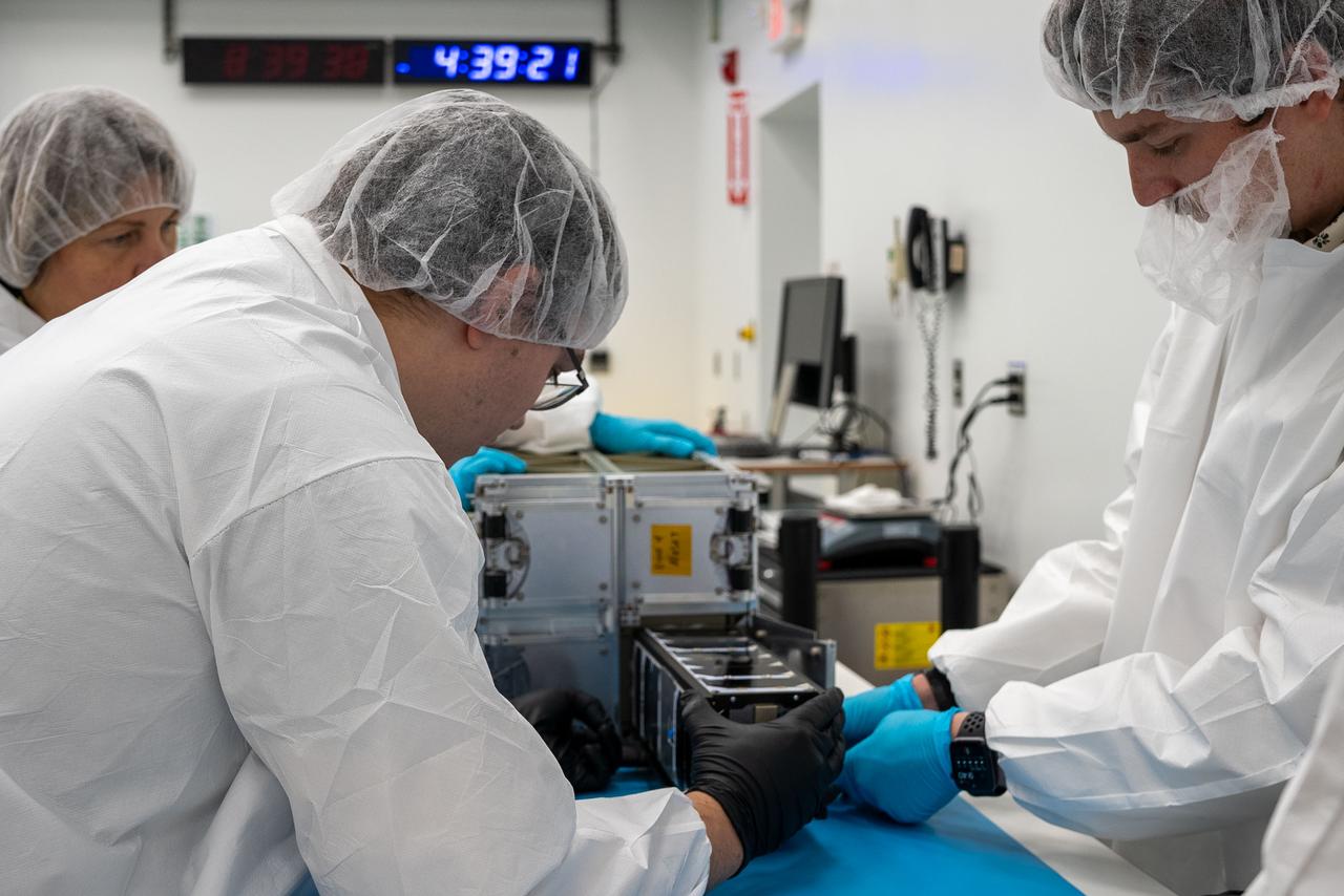 Technicians with the University of Kansas prepare their KUbeSat-1 for integration at Firefly’s Payload Processing Facility at Vandenberg Space Force Base, California on Thursday, April 25, 2024. KUbeSat-1, along with several other CubeSats, will launch to space on an Alpha rocket during NASA’s Educational Launch of Nanosatellites (ELaNa) 43 mission as part of the agency’s CubeSat Launch Initiative and Firefly’s Venture-Class Launch Services Demonstration 2 contract.