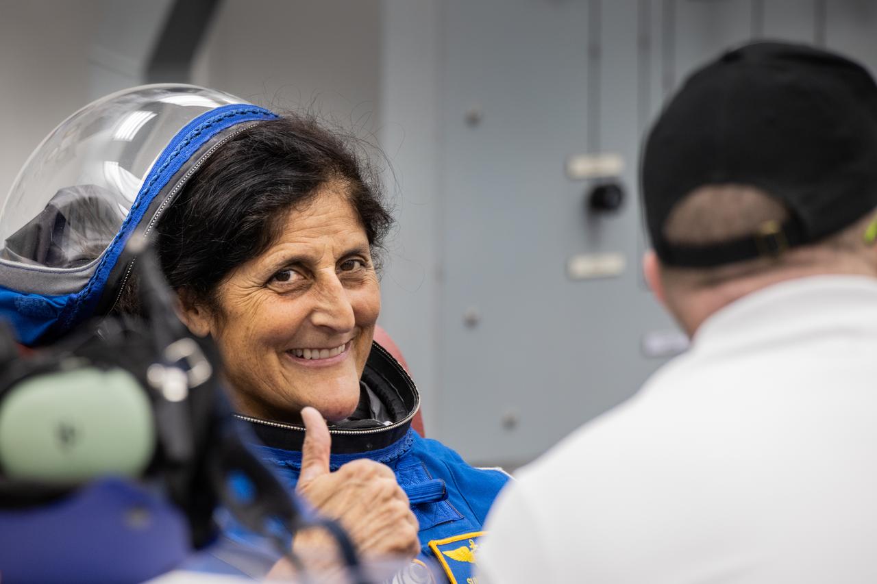 During a mission dress rehearsal, NASA’s Boeing Crew Flight Test astronaut Suni Williams flashes a thumbs up in her Boeing spacesuit inside the crew suit-up room inside the Neil A. Armstrong Operations and Checkout Building at the agency’s Kennedy Space Center in Florida on Friday, April 26, 2024. As part of the agency’s Commercial Crew Program, Wilmore and Williams are the first to launch to the International Space Station aboard Boeing’s Starliner spacecraft. Liftoff atop a United Launch Alliance Atlas V rocket from Space Launch Complex-41 at nearby Cape Canaveral Space Force Station is scheduled for 10:34 p.m. ET Monday, May 6.