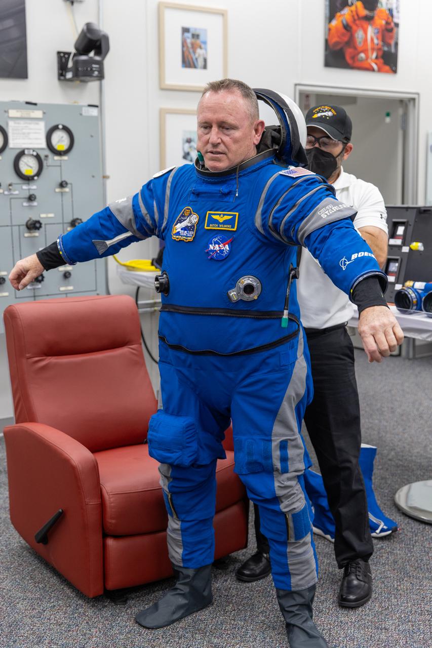 During the first launch attempt of NASA’s Boeing Crew Flight Test, NASA astronaut Butch Wilmore performs checks of his Boeing spacesuit in the crew suit-up room inside the Neil A. Armstrong Operations and Checkout Building at NASA’s Kennedy Space Center in Florida on Monday, May 6, 2024. As part of the agency’s Commercial Crew Program, the first crewed launch to the International Space Station aboard Boeing’s Starliner spacecraft atop a United Launch Alliance Atlas V rocket from Space Launch Complex-41 at nearby Cape Canaveral Space Force Station was targeted for 10:34 p.m. ET but scrubbed for the day.