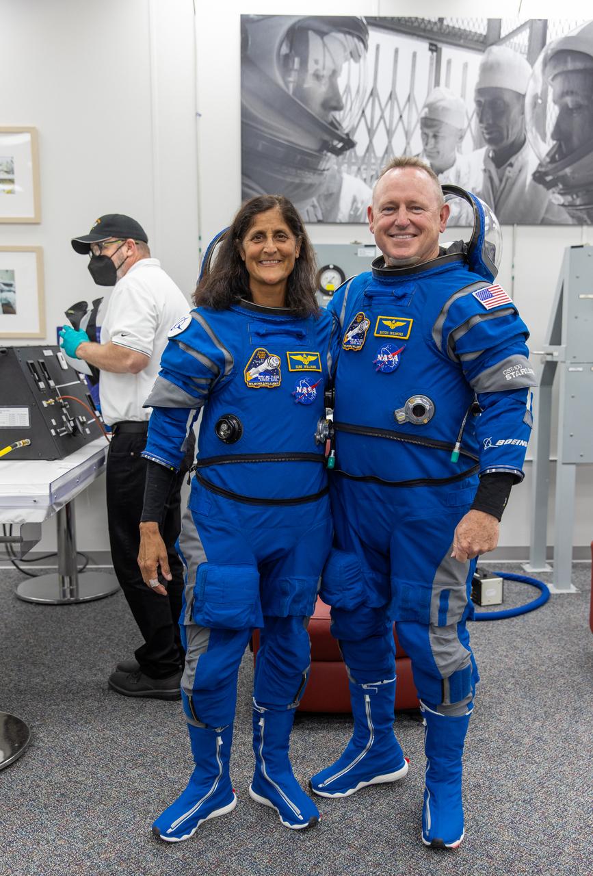 During the first launch attempt of NASA’s Boeing Crew Flight Test, NASA astronauts Butch Wilmore and Suni Williams pose for photos inside the suit-up room inside the Neil A. Armstrong Operations and Checkout Building at NASA’s Kennedy Space Center in Florida on Monday, May 6, 2024. As part of the agency’s Commercial Crew Program, the first crewed launch to the International Space Station aboard Boeing’s Starliner spacecraft atop a United Launch Alliance Atlas V rocket from Space Launch Complex-41 at nearby Cape Canaveral Space Force Station was targeted for 10:34 p.m. ET but scrubbed for the day.