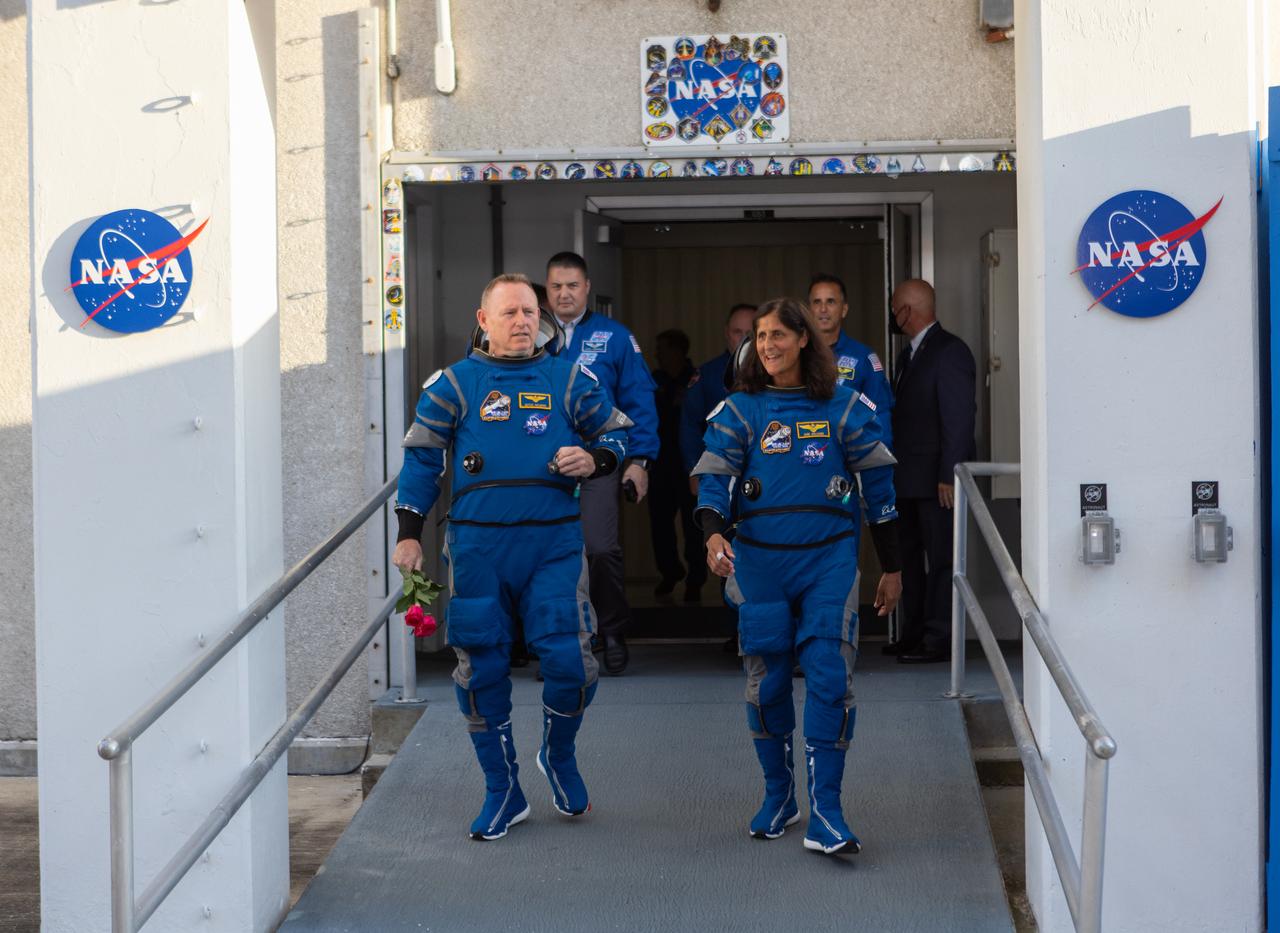 During the first launch attempt of NASA’s Boeing Crew Flight Test, NASA astronauts Butch Wilmore and Suni Williams walk out of the Neil A. Armstrong Operations and Checkout Building on Monday, May 6, 2024, at the agency’s Kennedy Space Center in Florida. As part of the agency’s Commercial Crew Program, the first crewed launch to the International Space Station aboard Boeing’s Starliner spacecraft atop a United Launch Alliance Atlas V rocket from Space Launch Complex-41 at nearby Cape Canaveral Space Force Station was targeted for 10:34 p.m. ET but scrubbed for the day.