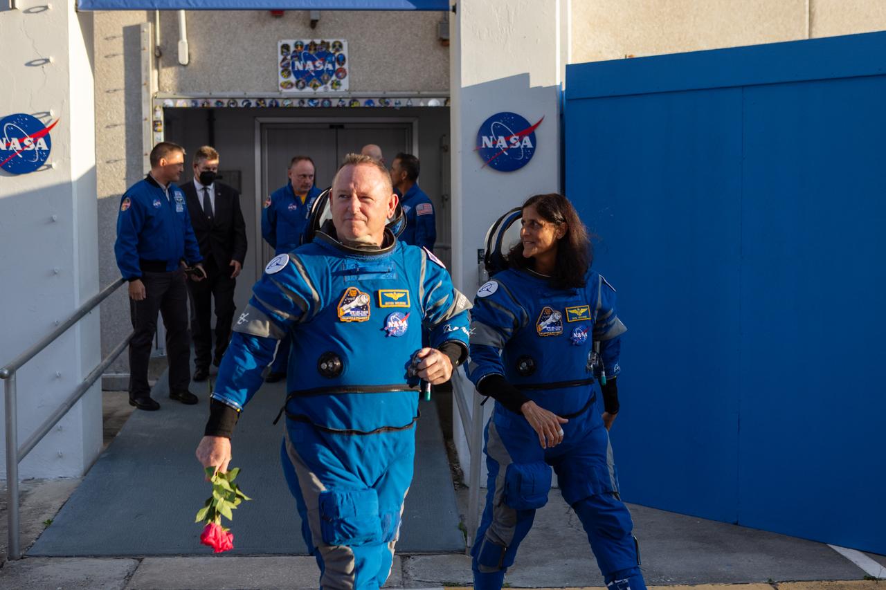 During the first launch attempt of NASA’s Boeing Crew Flight Test, NASA astronauts Butch Wilmore and Suni Williams walk out of the Neil A. Armstrong Operations and Checkout Building on Monday, May 6, 2024, at the agency’s Kennedy Space Center in Florida. As part of the agency’s Commercial Crew Program, the first crewed launch to the International Space Station aboard Boeing’s Starliner spacecraft atop a United Launch Alliance Atlas V rocket from Space Launch Complex-41 at nearby Cape Canaveral Space Force Station was targeted for 10:34 p.m. ET but scrubbed for the day.