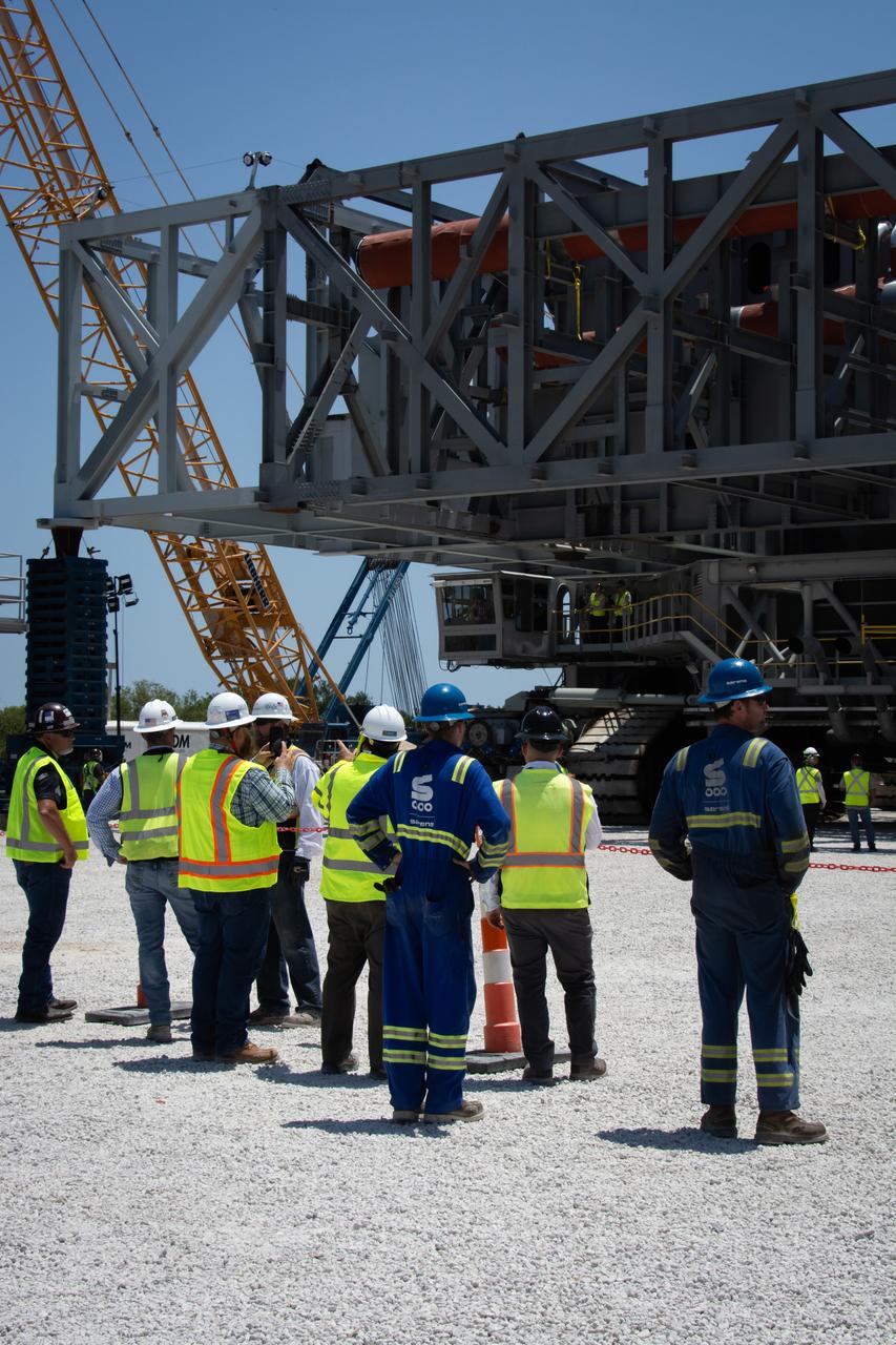 On Thursday, May 9, 2024, teams with NASA’s Exploration Ground Systems Program and primary contractor, Bechtel National, Inc., continue moving the base structure of mobile launcher 2 to a permanent mount structure where assembly will be completed at Kennedy Space Center in Florida. The 355-foot-tall mobile launcher 2 with a two-story base and a tower will be used to assemble and process the SLS (Space Launch System) rocket and Orion spacecraft in the Vehicle Assembly Building on NASA’s upcoming Artemis missions to the Moon beginning with Artemis IV.