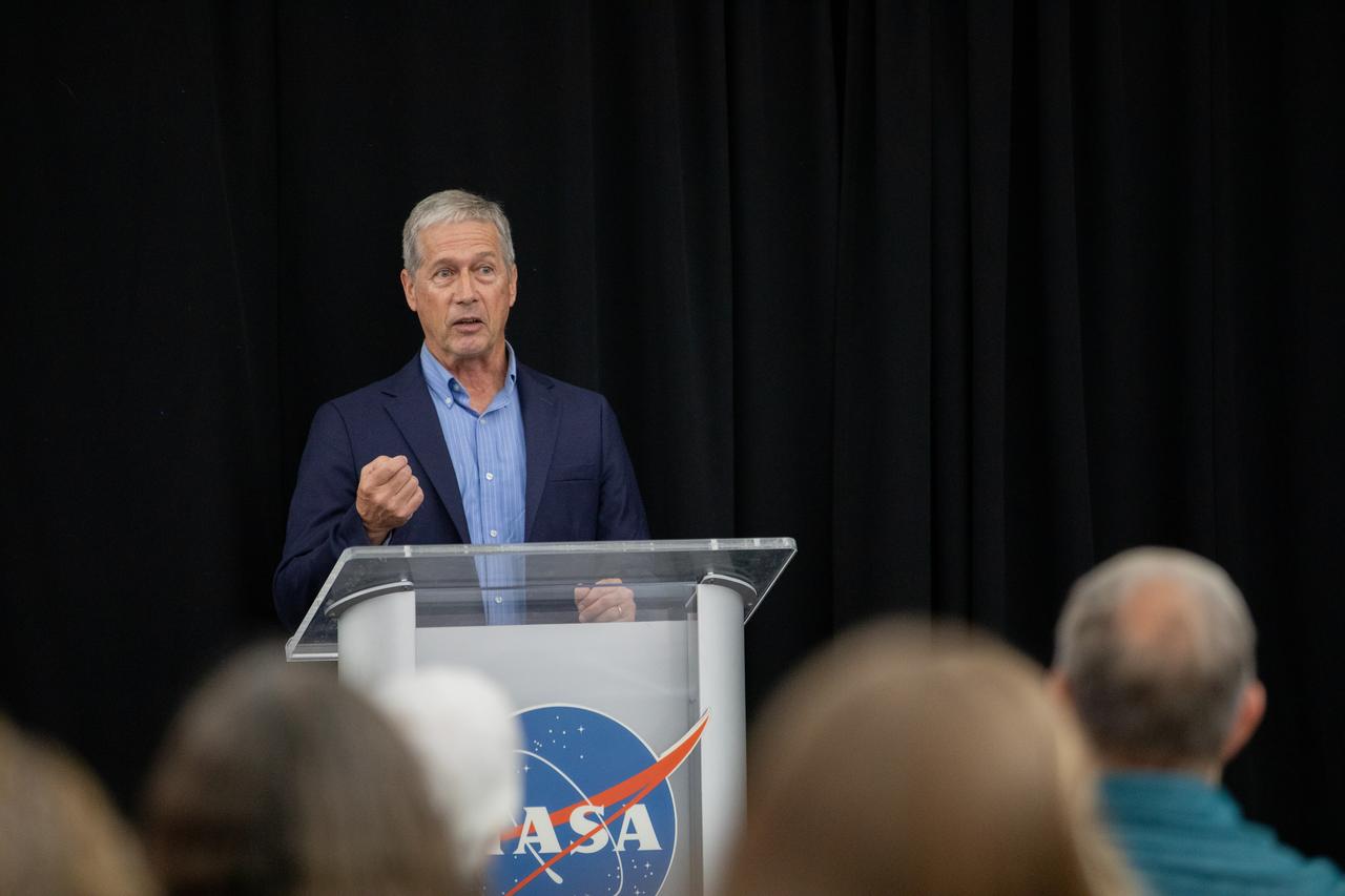 Dan Billow accepts a certificate naming him a Kennedy Chronicler during a May 15 ceremony at the Press Site at NASA’s Kennedy Space Center in Florida. Billow, a retired television broadcaster, was among three reporters and industry professionals who were nominated by their peers and selected by a panel of NASA officials and current space reporters. Brass plates bearing their names were added to the wall of the “bull pen,” where reporters traditionally gather to cover launches and events at NASA Kennedy.