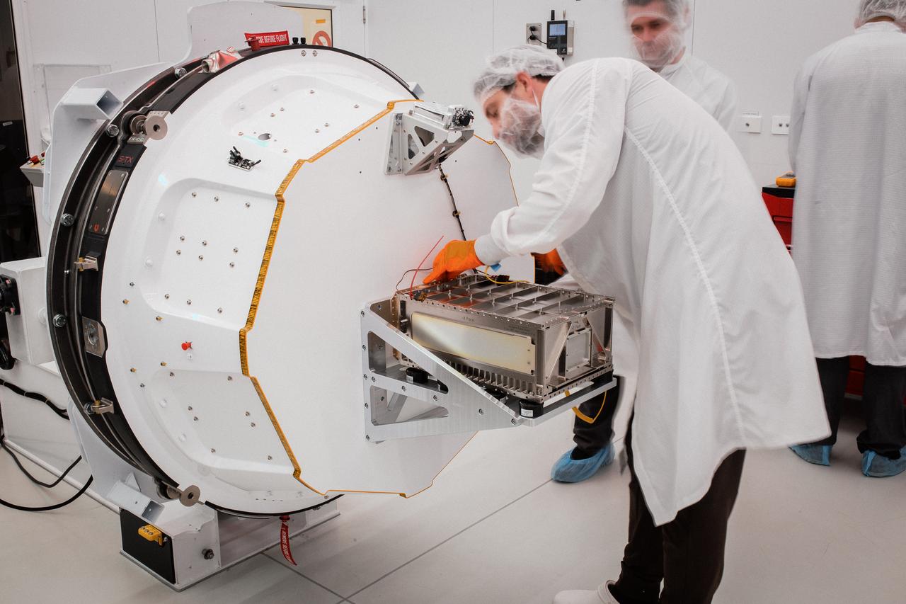 Technicians integrate NASA’s PREFIRE (Polar Radiant Energy in the Far-InfraRed Experiment) payload inside the Rocket Lab Electron rocket payload fairing on Wednesday, May 15, 2024, at the company’s facility in New Zealand. The agency’s PREFIRE mission to study heat loss to space in Earth’s polar regions will launch two CubeSats on two different flights aboard Rocket Lab's Electron rockets from the company’s Launch Complex 1 in Māhia, New Zealand.