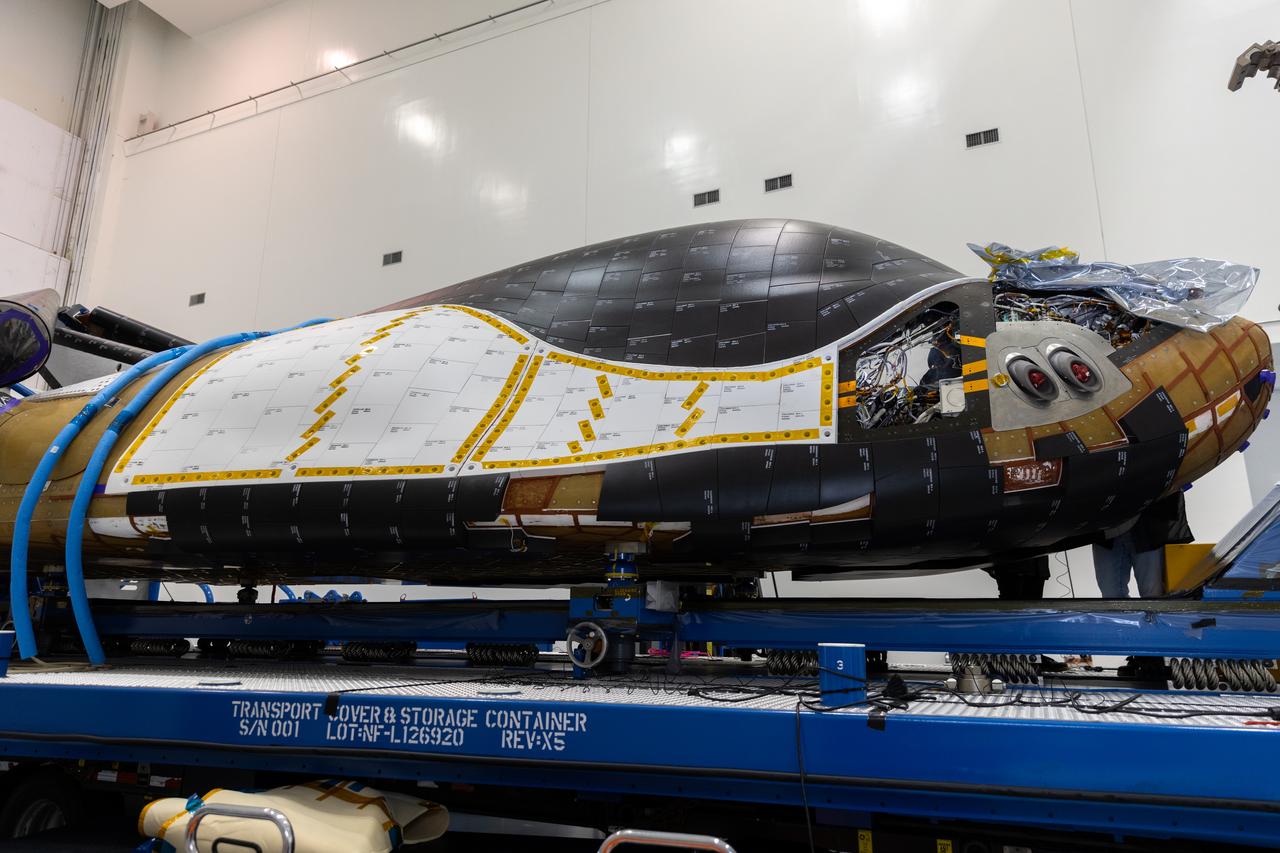Dream Chaser Tenacity, Sierra Space's uncrewed cargo spaceplane is processed inside the Space Systems Processing Facility (SSPF) at NASA’s Kennedy Space Center in Florida on Monday, May 20, 2024, after arriving by truck inside a climate-controlled transportation container, completing the journey from the agency's Neil Armstrong Test Facility in Ohio. Dream Chaser Tenacity will undergo final testing and prelaunch processing inside the high bay of the SSPF ahead of its inaugural launch atop a ULA (United Launch Alliance) Vulcan rocket from nearby Cape Canaveral Space Force Station. The reusable transportation system is contracted to perform a minimum of seven cargo missions to the International Space Station as part of the agency’s efforts to expand commercial resupply services to low Earth orbit.