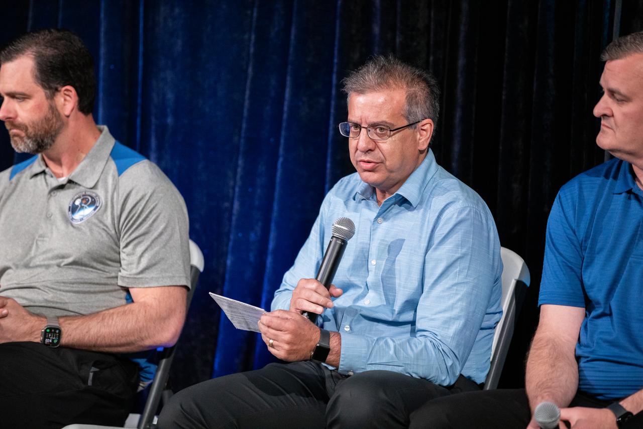 In the middle, Emilio Cruz, deputy director, NASA’s Exploration Research and Technology Programs, speaks to a crowd gathered for the 2024 Kennedy Space Center Community Leaders Update on Thursday, May 23, 2024, held at the center’s Visitor Complex. From left, Jeremy Parsons, deputy manager, NASA’s Exploration Ground Systems, and Mark Weise, manager, Gateway Deep Space Logistics, discussed how programs based at NASA Kennedy support the agency’s efforts to return humans to the Moon in preparation for Mars and answered questions from guests.