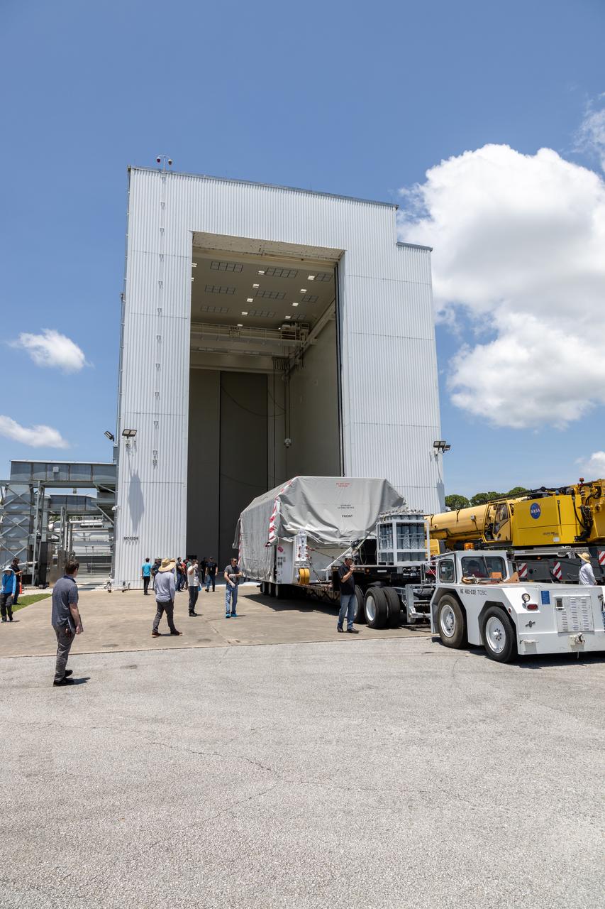 NASA’s largest planetary mission spacecraft, Europa Clipper, arrives at the Payload Hazardous Servicing Facility at the agency’s Kennedy Space Center in Florida on Friday, May 24, 2024. Slated to launch aboard a SpaceX Falcon Heavy rocket later this year from Launch Complex 39A at Kennedy, Europa Clipper will help determine if conditions exist below the surface Jupiter’s fourth largest moon, Europa, that could support life. 
