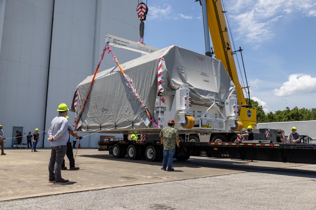 NASA’s largest planetary mission spacecraft, Europa Clipper, arrives at the Payload Hazardous Servicing Facility at the agency’s Kennedy Space Center in Florida on Friday, May 24, 2024. Slated to launch aboard a SpaceX Falcon Heavy rocket later this year from Launch Complex 39A at Kennedy, Europa Clipper will help determine if conditions exist below the surface Jupiter’s fourth largest moon, Europa, that could support life. 