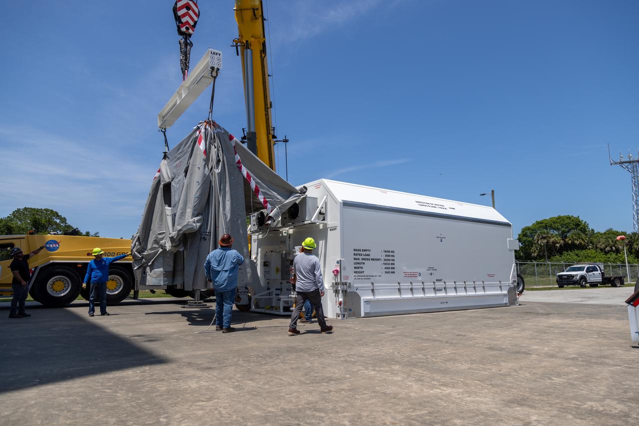 NASA’s largest planetary mission spacecraft, Europa Clipper, arrives at the Payload Hazardous Servicing Facility at the agency’s Kennedy Space Center in Florida on Friday, May 24, 2024. Slated to launch aboard a SpaceX Falcon Heavy rocket later this year from Launch Complex 39A at Kennedy, Europa Clipper will help determine if conditions exist below the surface Jupiter’s fourth largest moon, Europa, that could support life. 
