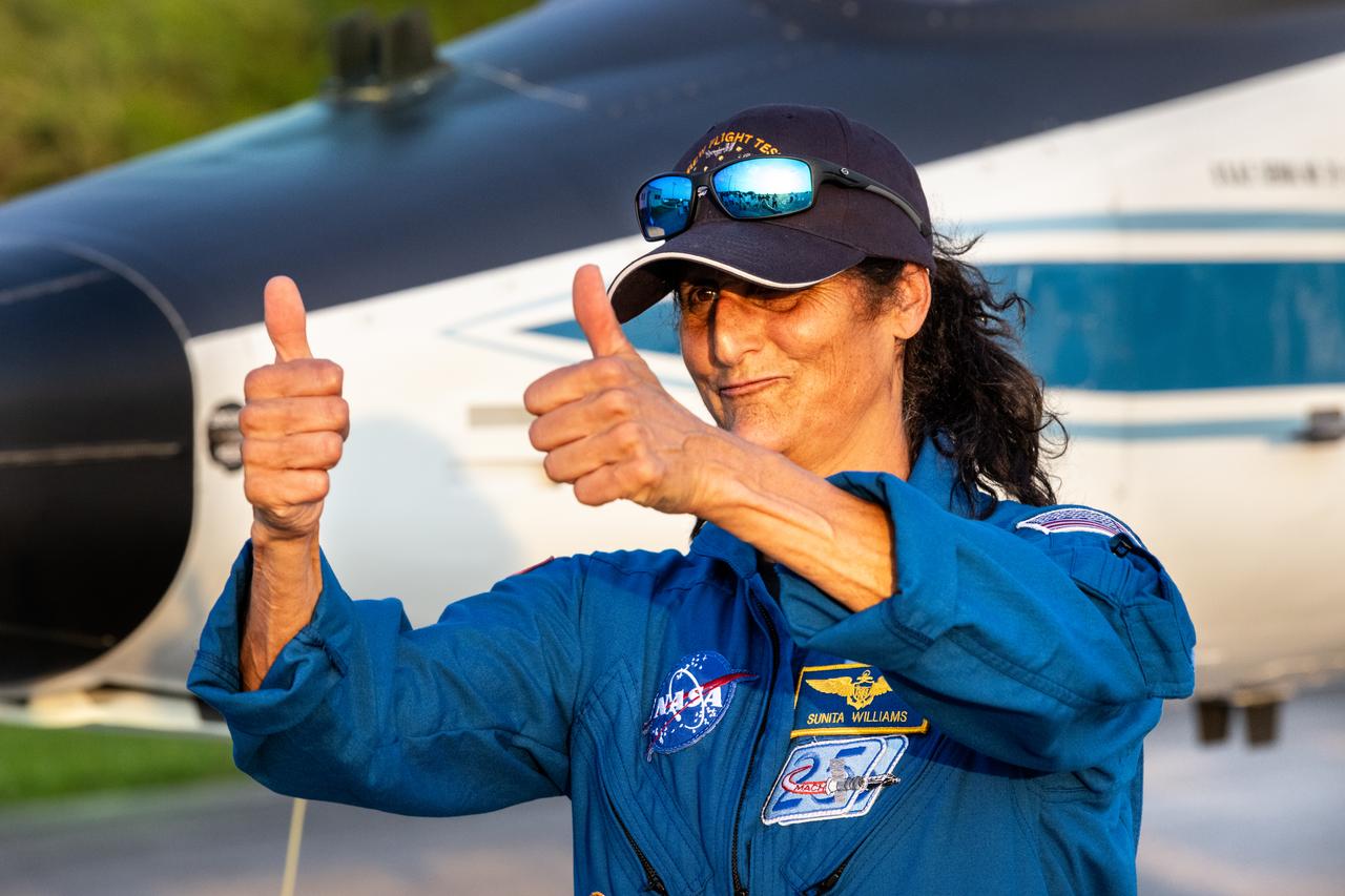 NASA astronaut Suni Williams poses for photos during her arrival back at the Launch and Landing Facility at the agency’s Kennedy Space Center in Florida on Tuesday, May 28, 2024, ahead of NASA’s Boeing Crew Flight Test. The first launch attempt on May 6 was scrubbed. As part of the agency’s Commercial Crew Program, Williams and fellow crew member Butch Wilmore are the first to launch to the International Space Station aboard Boeing’s Starliner spacecraft atop a United Launch Alliance Atlas V rocket from Space Launch Complex-41 at nearby Cape Canaveral Space Force Station. Liftoff is scheduled for 12:25 p.m. EDT on Saturday, June 1.
