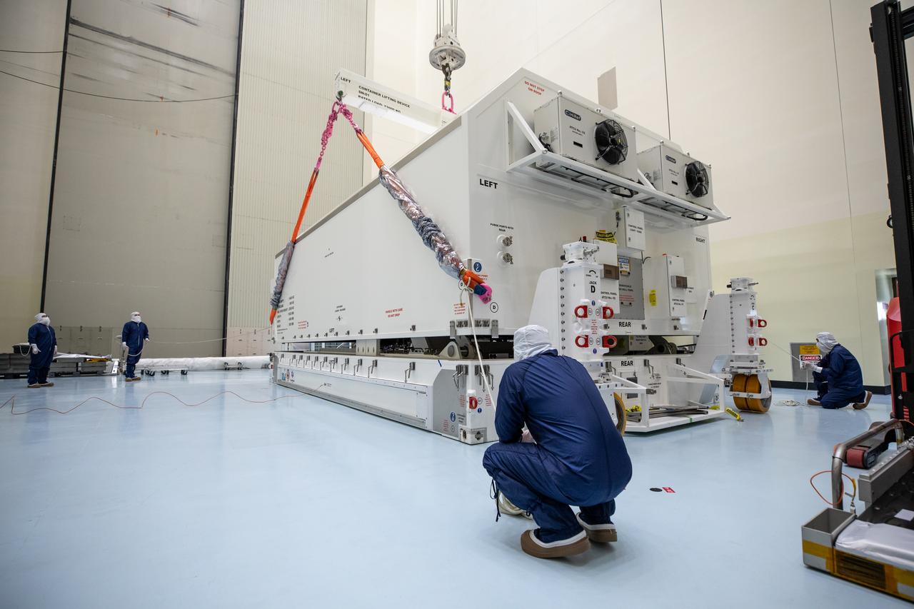 Technicians remove NASA’s largest planetary mission spacecraft, Europa Clipper, from its protective shipping container inside the Payload Hazardous Servicing Facility at the agency’s Kennedy Space Center in Florida on Tuesday, May 28, 2024. Slated to launch aboard a SpaceX Falcon Heavy rocket later this year from Launch Complex 39A at Kennedy, Europa Clipper will help determine if conditions exist below the surface Jupiter’s fourth largest moon, Europa that could support life. 