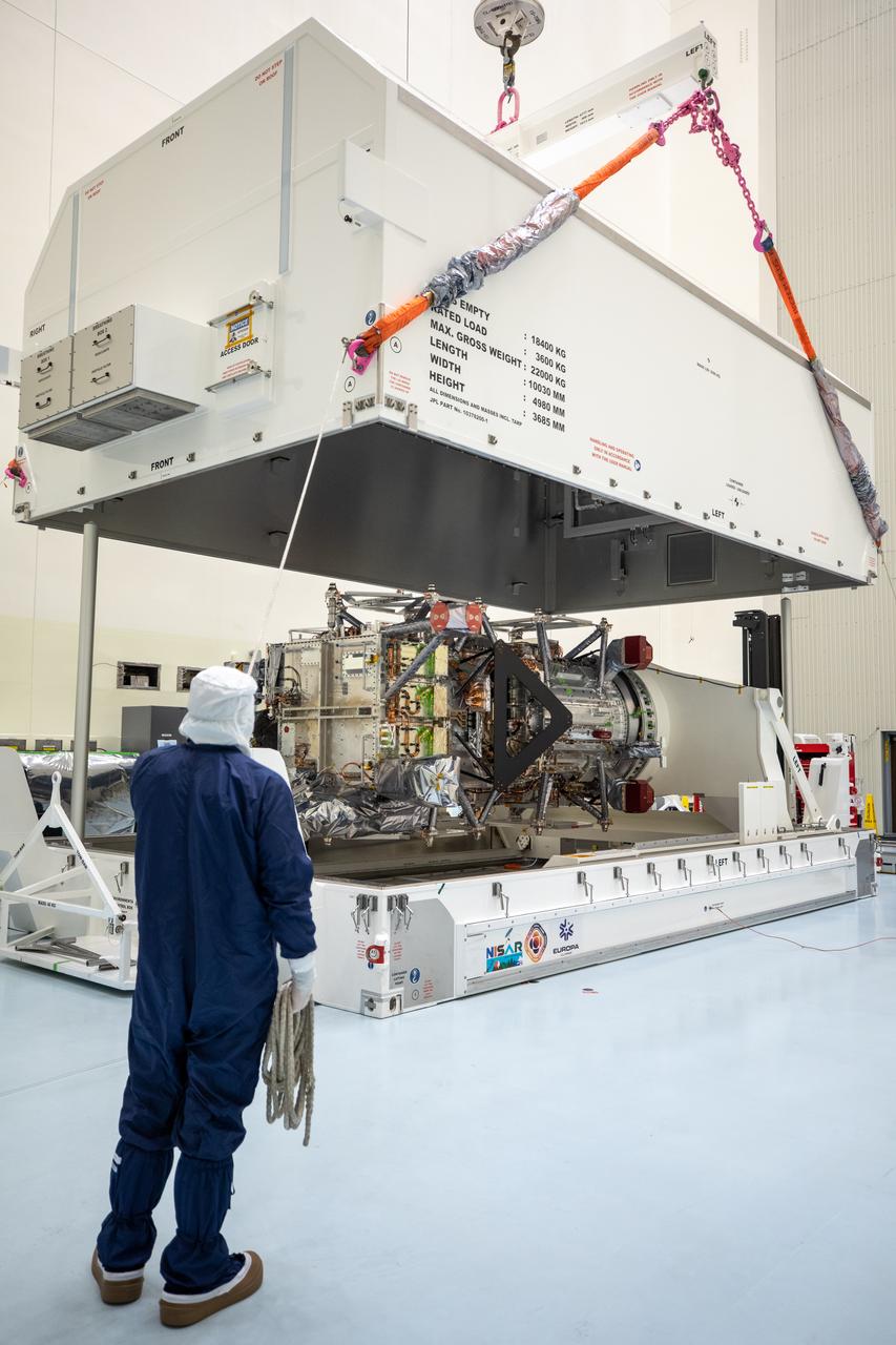 Technicians remove NASA’s largest planetary mission spacecraft, Europa Clipper, from its protective shipping container inside the Payload Hazardous Servicing Facility at the agency’s Kennedy Space Center in Florida on Tuesday, May 28, 2024. Slated to launch aboard a SpaceX Falcon Heavy rocket later this year from Launch Complex 39A at Kennedy, Europa Clipper will help determine if conditions exist below the surface Jupiter’s fourth largest moon, Europa that could support life. 