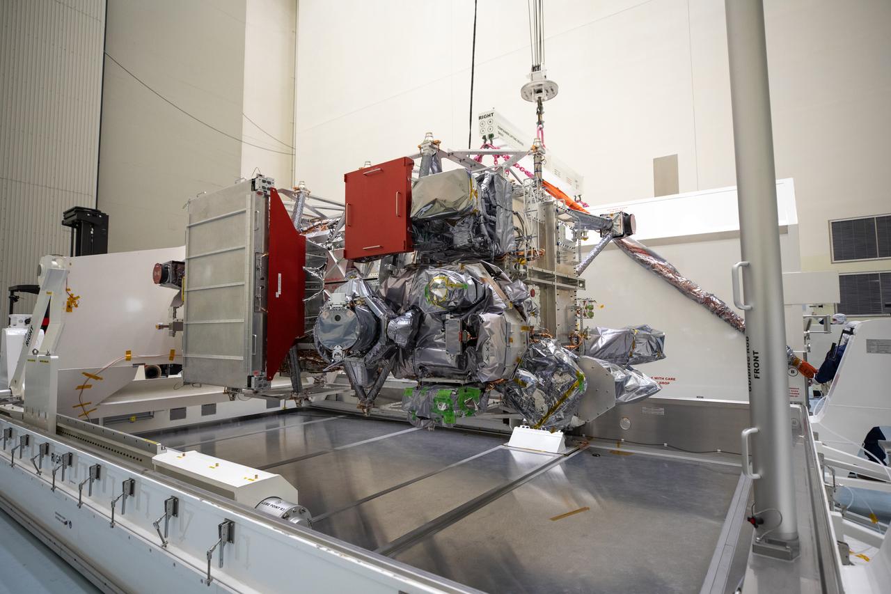 As part of prelaunch processing, crews inside the Payload Hazardous Servicing Facility at NASA’s Kennedy Space Center in Florida uncrate the agency’s largest planetary mission spacecraft, Europa Clipper, on Tuesday, May 28, 2024. Slated to launch aboard a SpaceX Falcon Heavy rocket later this year from Launch Complex 39A at Kennedy, Europa Clipper will help determine if conditions exist below the surface Jupiter’s fourth largest moon, Europa, that could support life. 