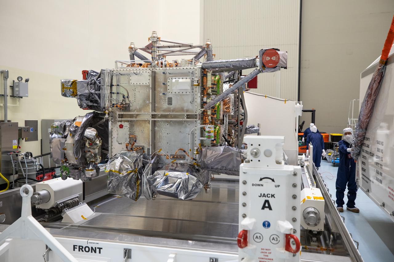 As part of prelaunch processing, crews inside the Payload Hazardous Servicing Facility at NASA’s Kennedy Space Center in Florida uncrate the agency’s largest planetary mission spacecraft, Europa Clipper, on Tuesday, May 28, 2024. Slated to launch aboard a SpaceX Falcon Heavy rocket later this year from Launch Complex 39A at Kennedy, Europa Clipper will help determine if conditions exist below the surface Jupiter’s fourth largest moon, Europa, that could support life. 