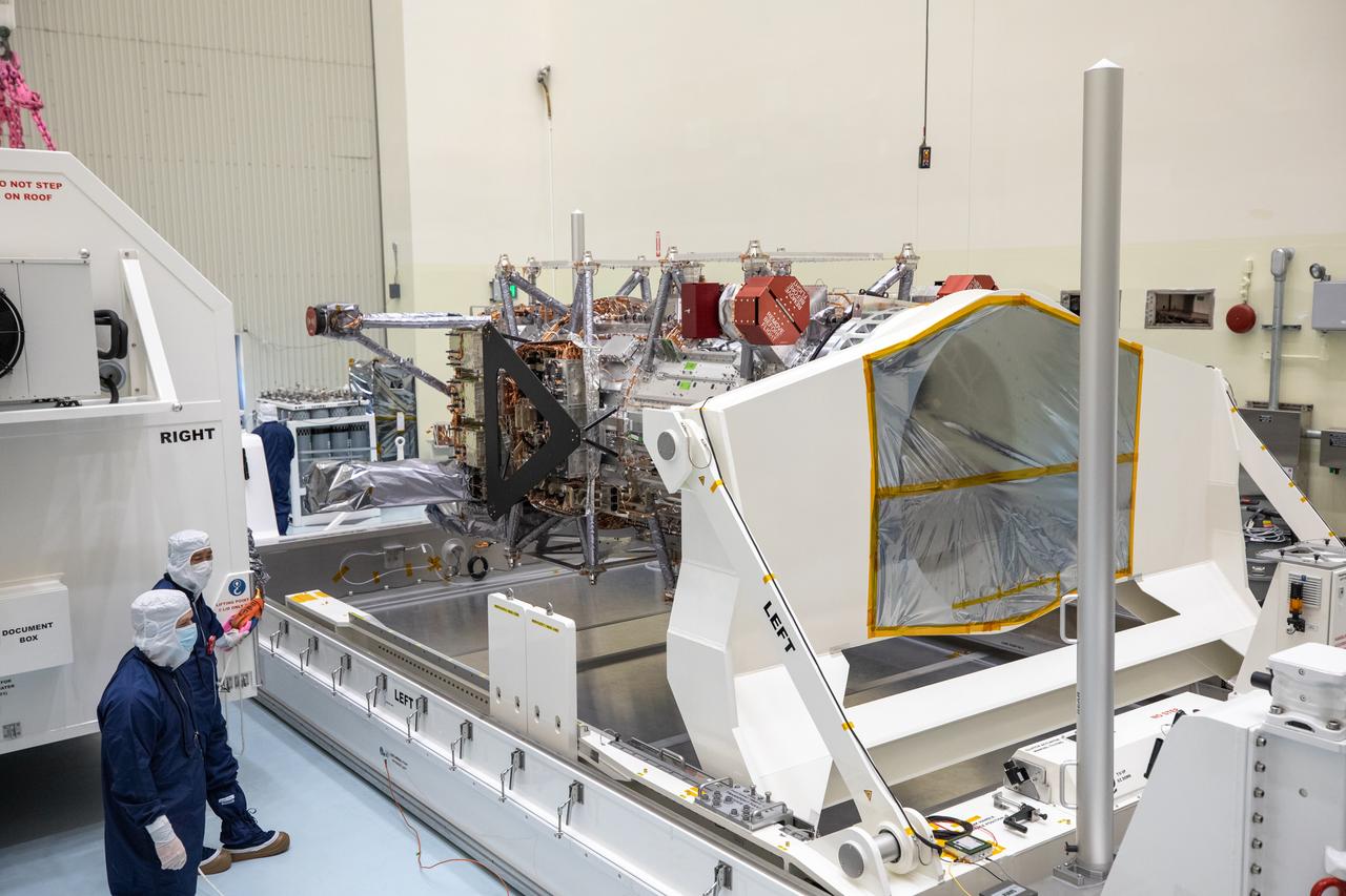 As part of prelaunch processing, crews inside the Payload Hazardous Servicing Facility at NASA’s Kennedy Space Center in Florida uncrate the agency’s largest planetary mission spacecraft, Europa Clipper, on Tuesday, May 28, 2024. Slated to launch aboard a SpaceX Falcon Heavy rocket later this year from Launch Complex 39A at Kennedy, Europa Clipper will help determine if conditions exist below the surface Jupiter’s fourth largest moon, Europa, that could support life. 