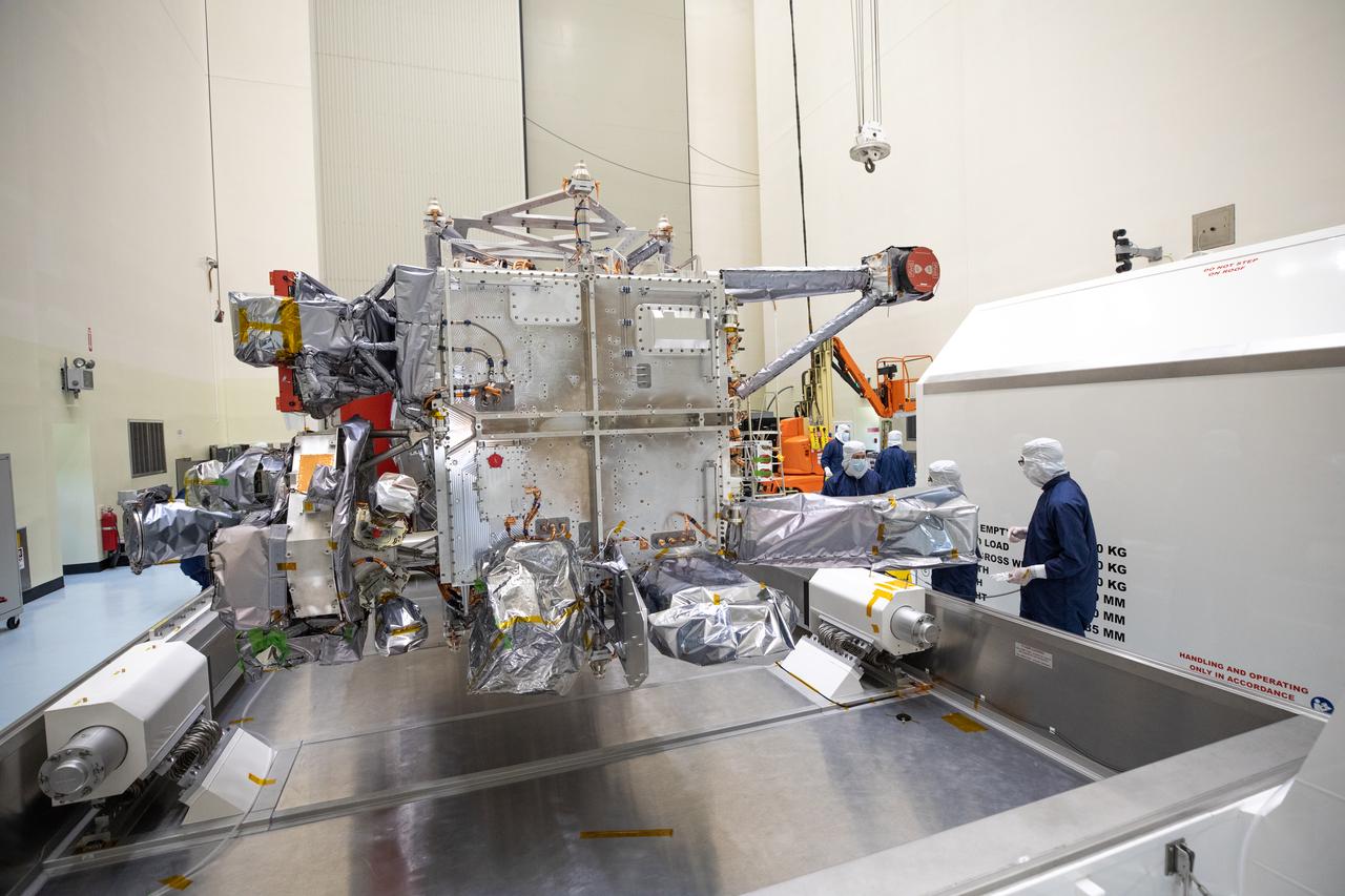 As part of prelaunch processing, crews inside the Payload Hazardous Servicing Facility at NASA’s Kennedy Space Center in Florida uncrate the agency’s largest planetary mission spacecraft, Europa Clipper, on Tuesday, May 28, 2024. Slated to launch aboard a SpaceX Falcon Heavy rocket later this year from Launch Complex 39A at Kennedy, Europa Clipper will help determine if conditions exist below the surface Jupiter’s fourth largest moon, Europa, that could support life. 