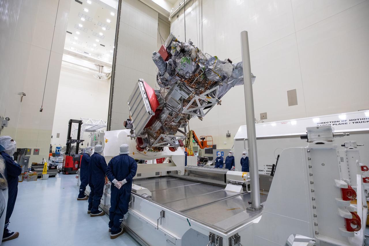Technicians inside the Payload Hazardous Servicing Facility at NASA’s Kennedy Space Center in Florida prepare to rotate the agency’s largest planetary mission spacecraft, Europa Clipper, to a vertical position on Tuesday, May 28, 2024, as part of prelaunch processing. Slated to launch aboard a SpaceX Falcon Heavy rocket later this year from Launch Complex 39A at Kennedy, Europa Clipper will help determine if conditions exist below the surface Jupiter’s fourth largest moon, Europa, that could support life.
