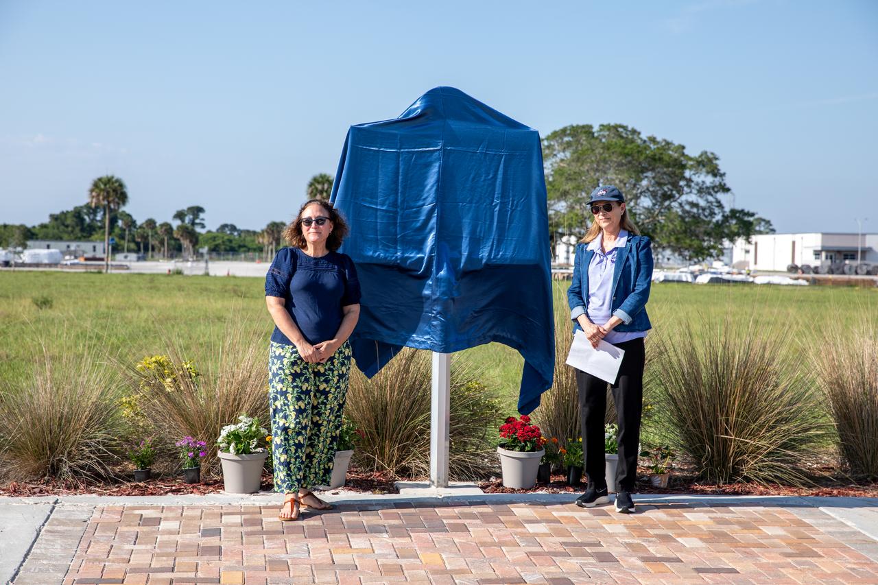 From the left, Katherine Zeringue, cultural resources manager, NASA’s Kennedy Space Center, is joined by Janet Petro, NASA Kennedy Space Center director, at a ceremony held Tuesday, May 28, 2024, to unveil a large bronze historical marker plaque at the location of NASA Kennedy’s original headquarters building. Approved in April 2023 as part of the State of Florida’s Historical Markers program in celebration of National Historic Preservation Month, the marker commemorates the early days of space exploration and is displayed permanently just west of the seven-story, 200,000 square foot Central Campus Headquarters Building, which replaced the old building in 2019.  