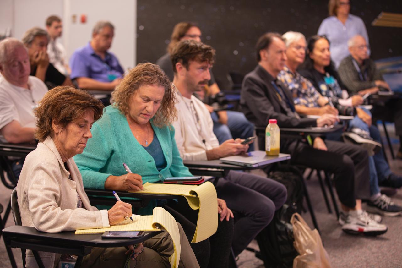 Members of the media attend a prelaunch briefing for NASA’s Boeing Crew Flight Test at the agency’s Kennedy Space Center in Florida, Friday, May 31, 2024. As part of the agency’s Commercial Crew Program, NASA astronauts Butch Wilmore and Suni Williams are the first to launch aboard Boeing’s Starliner spacecraft atop a ULA Atlas V rocket from Space Launch Complex-41 at Cape Canaveral Space Force Station in Florida. Liftoff is scheduled for 12:25 p.m. ET on Saturday, June 1.
