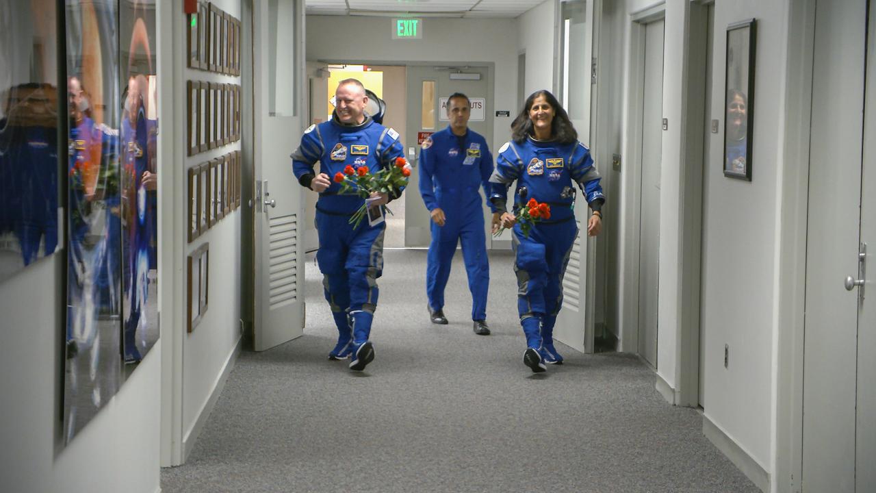 After suit-up and final fit checks, NASA’s Boeing Crew Flight Test astronauts Butch Wilmore and Suni Williams exit the Astronaut Crew Quarters inside Kennedy Space Center’s Neil A. Armstrong Operations and Checkout Building in Florida during a launch attempt on Saturday, June 1, 2024. The crew members will be the first to launch to the International Space Station aboard Boeing’s Starliner spacecraft atop a United Launch Alliance Atlas V rocket from Space Launch Complex-41 at nearby Cape Canaveral Space Force Station. Liftoff was scheduled for12:25 p.m. EDT but scrubbed for the day.