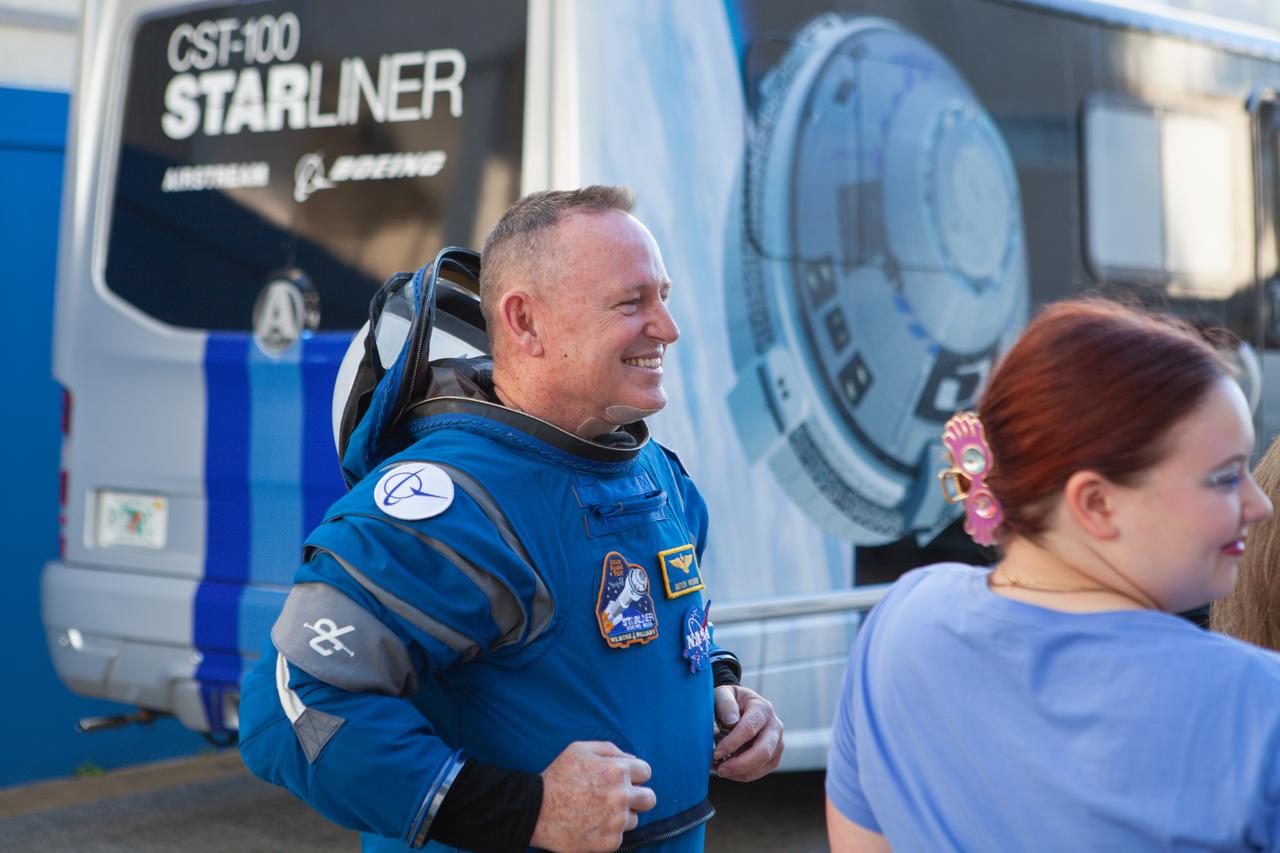 NASA’s Boeing Crew Flight Test astronaut Butch Wilmore says goodbye to friends and family upon exiting the Neil A. Armstrong Operations and Checkout Building at NASA’s Kennedy Space Center in Florida on Wednesday, June 5, 2024. Wilmore, accompanied by NASA astronaut Suni Williams, is preparing to load up into Boeing’s Astrovan for the trip to the launch pad of Space Launch Complex-41 at nearby Cape Canaveral Space Force Station, where the duo will launch to the International Space Station aboard Boeing’s Starliner spacecraft atop a United Launch Alliance Atlas V rocket at 10:52 a.m. EDT.