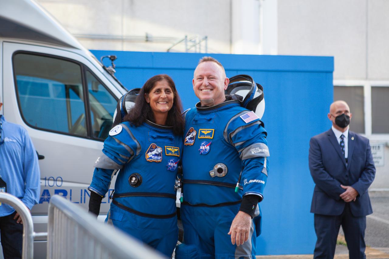 NASA’s Boeing Crew Flight Test astronauts Butch Wilmore and Suni Williams say goodbye to friends and family upon exiting the Neil A. Armstrong Operations and Checkout Building at NASA’s Kennedy Space Center in Florida on Wednesday, June 5, 2024. The crew members are on their way to load up into Boeing’s Astrovan for the trip to the launch pad of Space Launch Complex-41 at nearby Cape Canaveral Space Force Station, where they will launch to the International Space Station aboard Boeing’s Starliner spacecraft atop a United Launch Alliance Atlas V rocket at 10:52 a.m. EDT.
