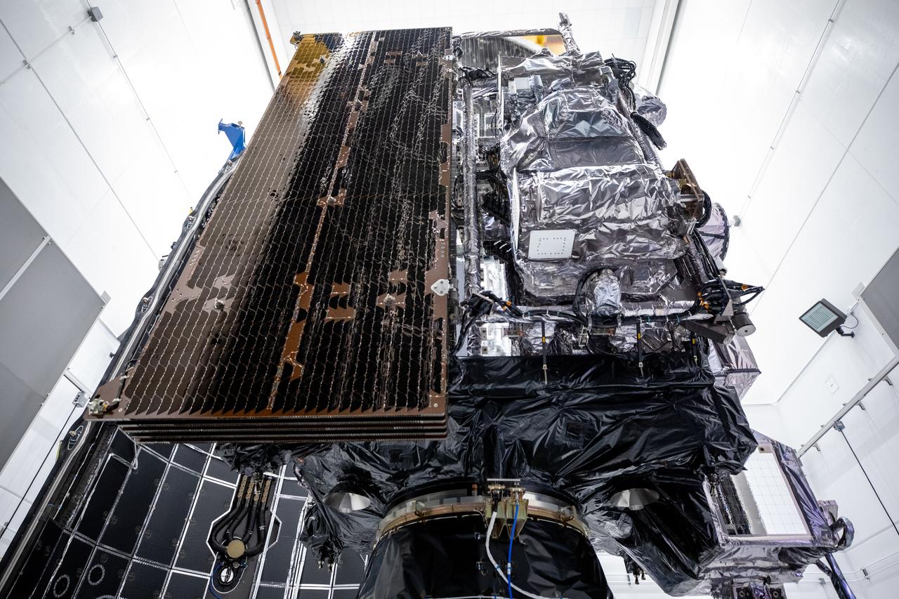 Technicians prepare NOAA’s (National Oceanic and Atmospheric Administration) Geostationary Operational Environmental Satellite (GOES-U) for encapsulation inside payload fairing halves on Thursday, June 13, 2024, at the Astrotech Space Operations facility in Titusville near NASA’s Kennedy Space Center in Florida. The fourth and final weather-observing and environmental monitoring satellite in NOAA’s GOES-R Series will assist meteorologists in providing advanced weather forecasting and warning capabilities. The two-hour window for liftoff opens 5:16 p.m. EDT Tuesday, June 25, aboard a SpaceX Falcon Heavy rocket from Launch Complex 39A at NASA’s Kennedy Space Center in Florida.