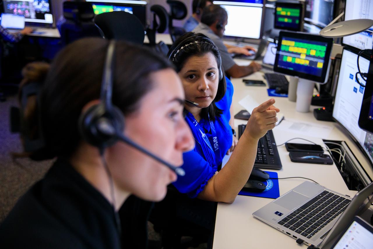 From left, Joan Misner, mission integration engineer with the Launch Services Program at NASA’s Kennedy Space Center and Jessica Conner, mission integration engineer at NASA Kennedy, participate in a mission dress rehearsal on Monday, June 17, 2024, inside Hangar AE at Cape Canaveral Space Force Station in Florida for the National Oceanic and Atmospheric Administration (NOAA) GOES-U (Geostationary Operational Environmental Satellite U) mission. The GOES-U satellite, the final addition to GOES-R series, will serve a critical role in providing continuous coverage of the Western Hemisphere, including monitoring tropical systems in the eastern Pacific and Atlantic oceans launched Tuesday, June 25, 2024.