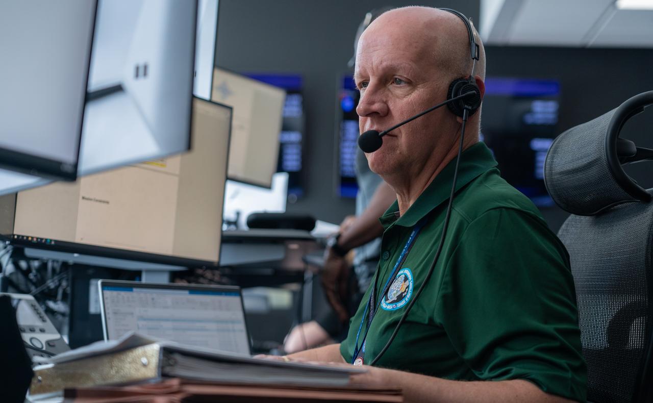 Tim Dunn, senior launch director for NASA’s Launch Services Program, participates in rehearsal launch operations for the National Oceanic and Atmospheric Administration (NOAA) GOES-U (Geostationary Operational Environmental Satellite U) mission inside Hangar X at NASA’s Kennedy Space Center in Florida on Monday, June 17, 2024. The GOES-U satellite, the final addition to GOES-R series, serves a critical role in providing continuous coverage of the Western Hemisphere, including monitoring tropical systems in the eastern Pacific and Atlantic oceans.