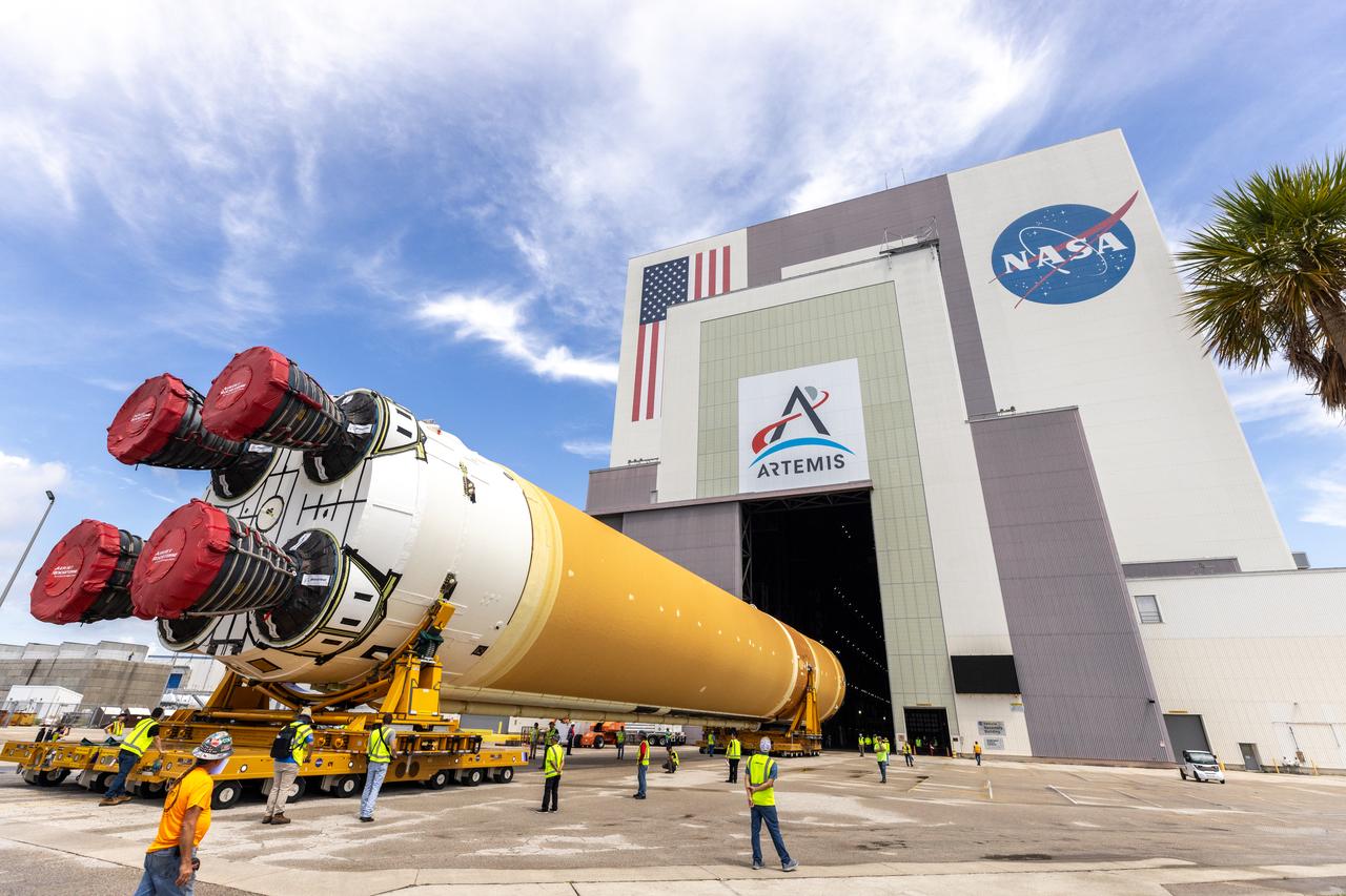 After completing its journey from NASA’s Michoud Assembly Facility in New Orleans aboard the Pegasus barge, teams with Exploration Ground Systems (EGS) transport the agency’s powerful SLS (Space Launch System) core stage to NASA’s Kennedy Space Center’s Vehicle Assembly Building in Florida on Wednesday, July 24, 2024. Once inside, SLS will be prepared for integration atop the mobile launcher ahead of the Artemis II launch.